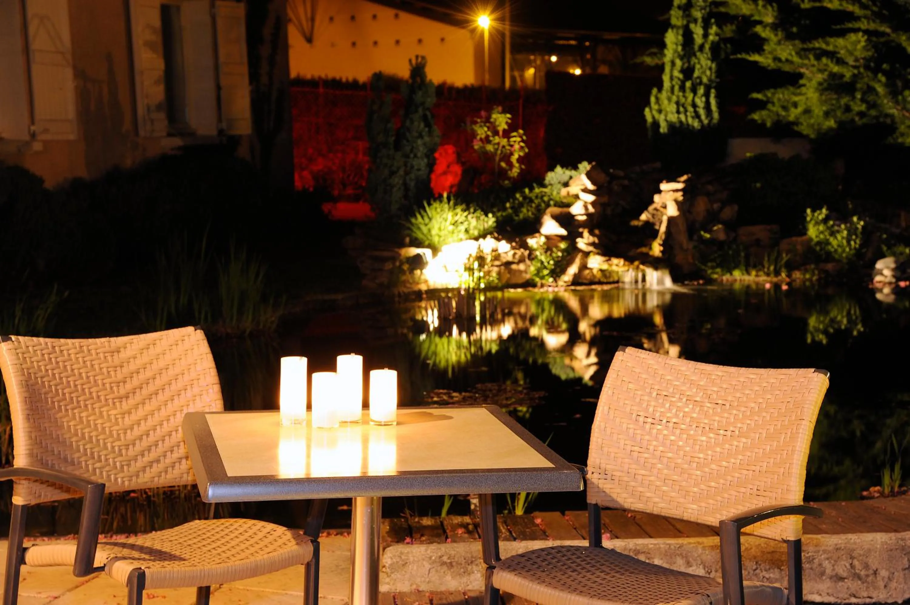 Patio in Logis Hotel Des Grands Vins