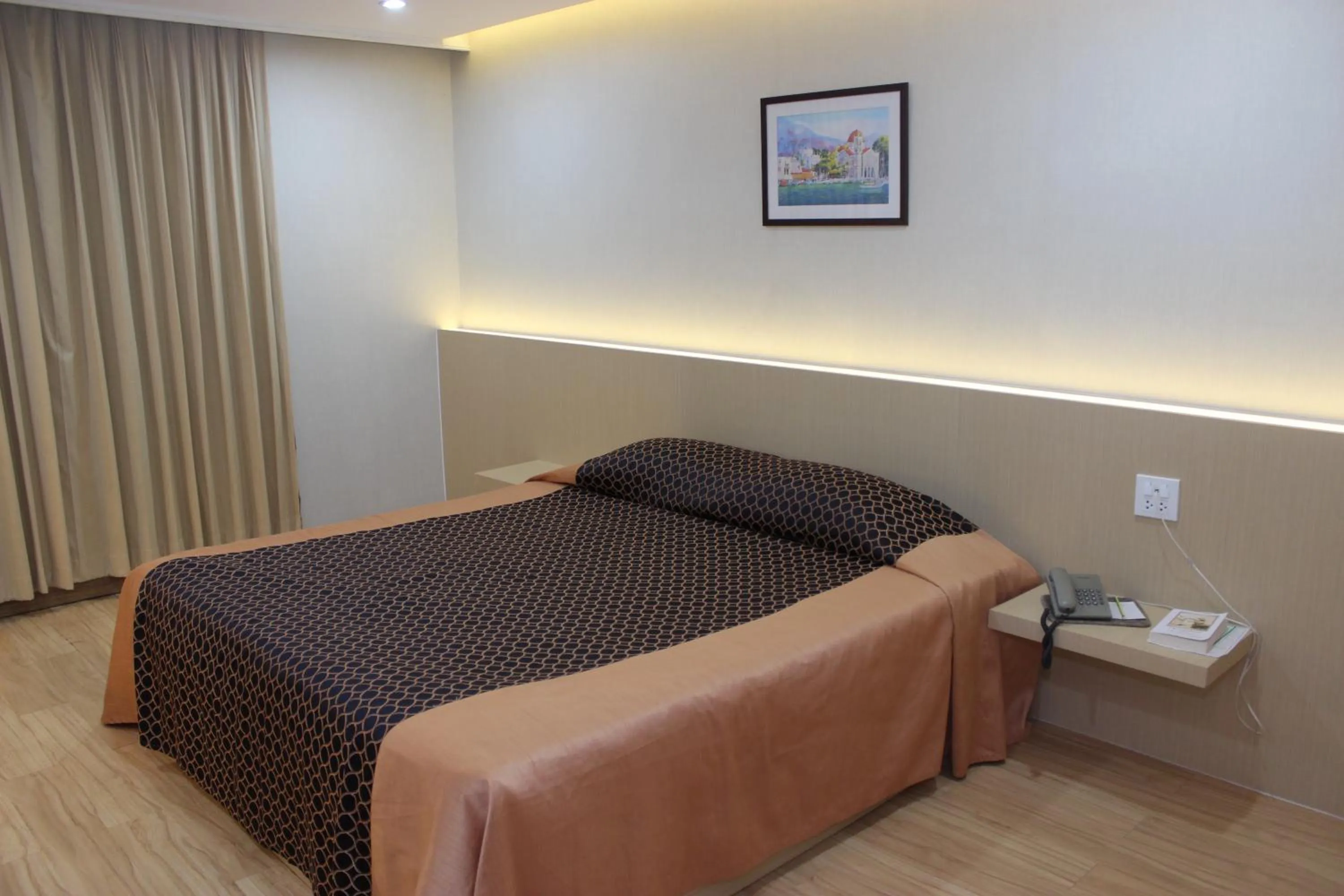 Bed in Charoen Hotel