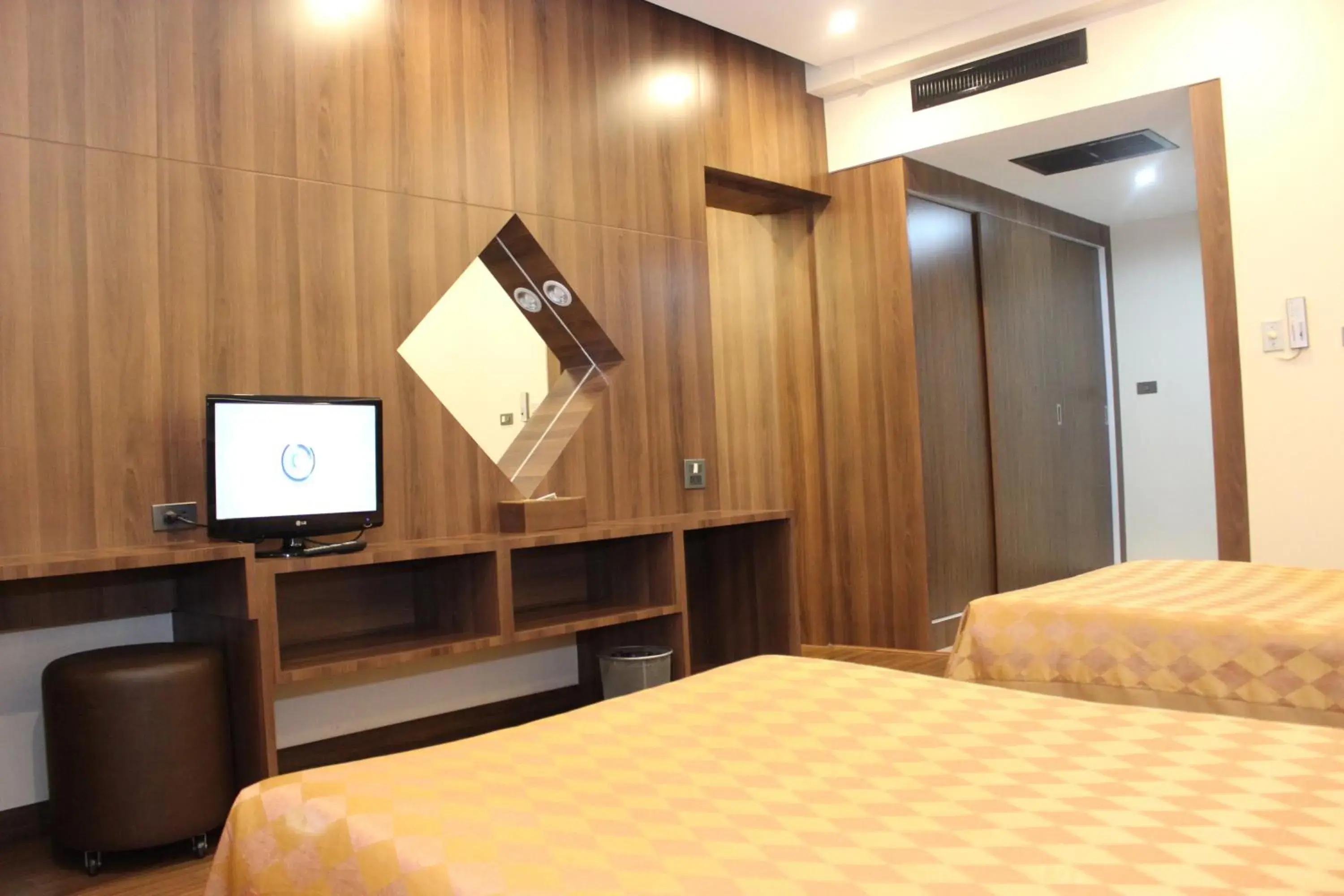 Bed in Charoen Hotel Bed in Charoen Hotel