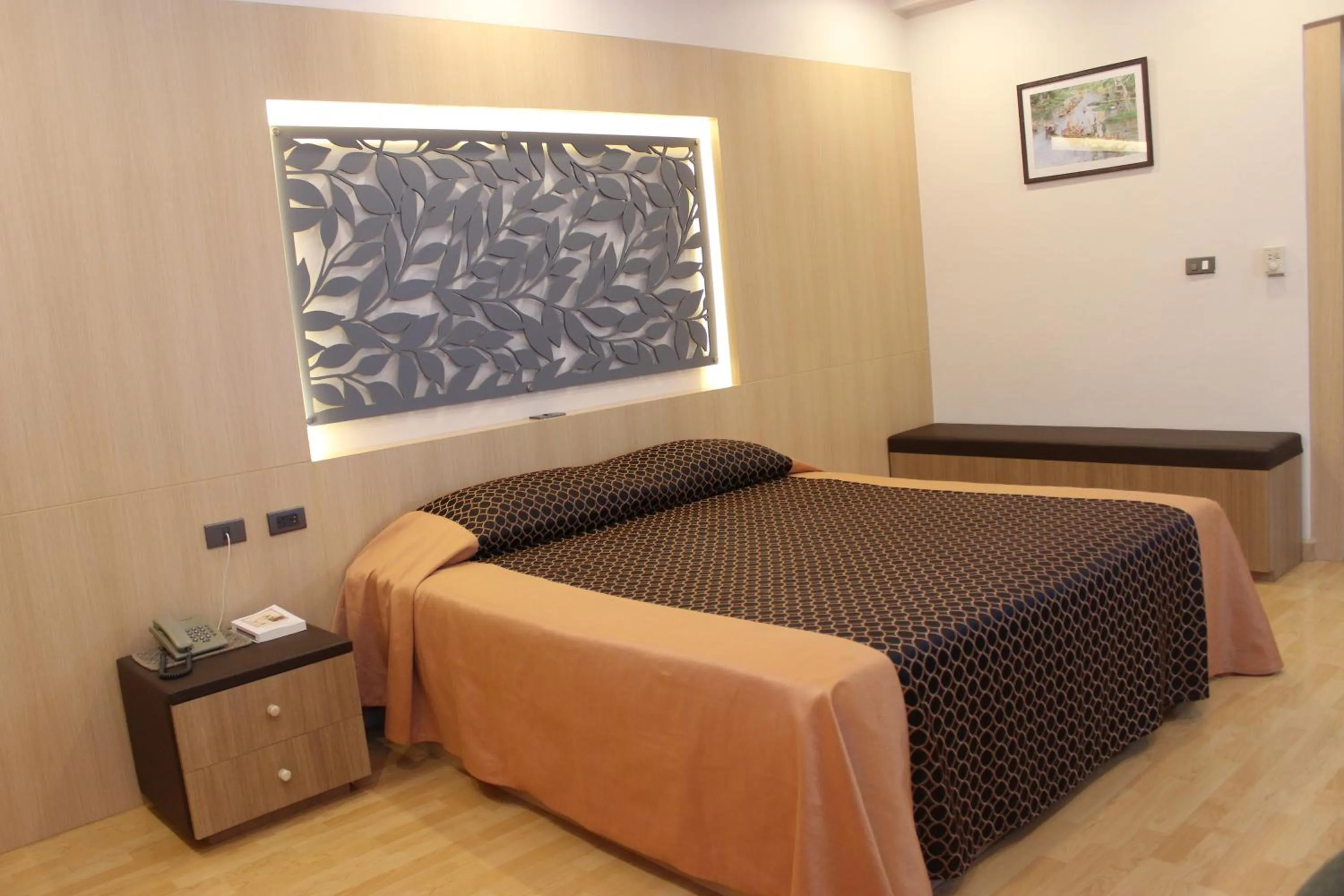 Bed in Charoen Hotel