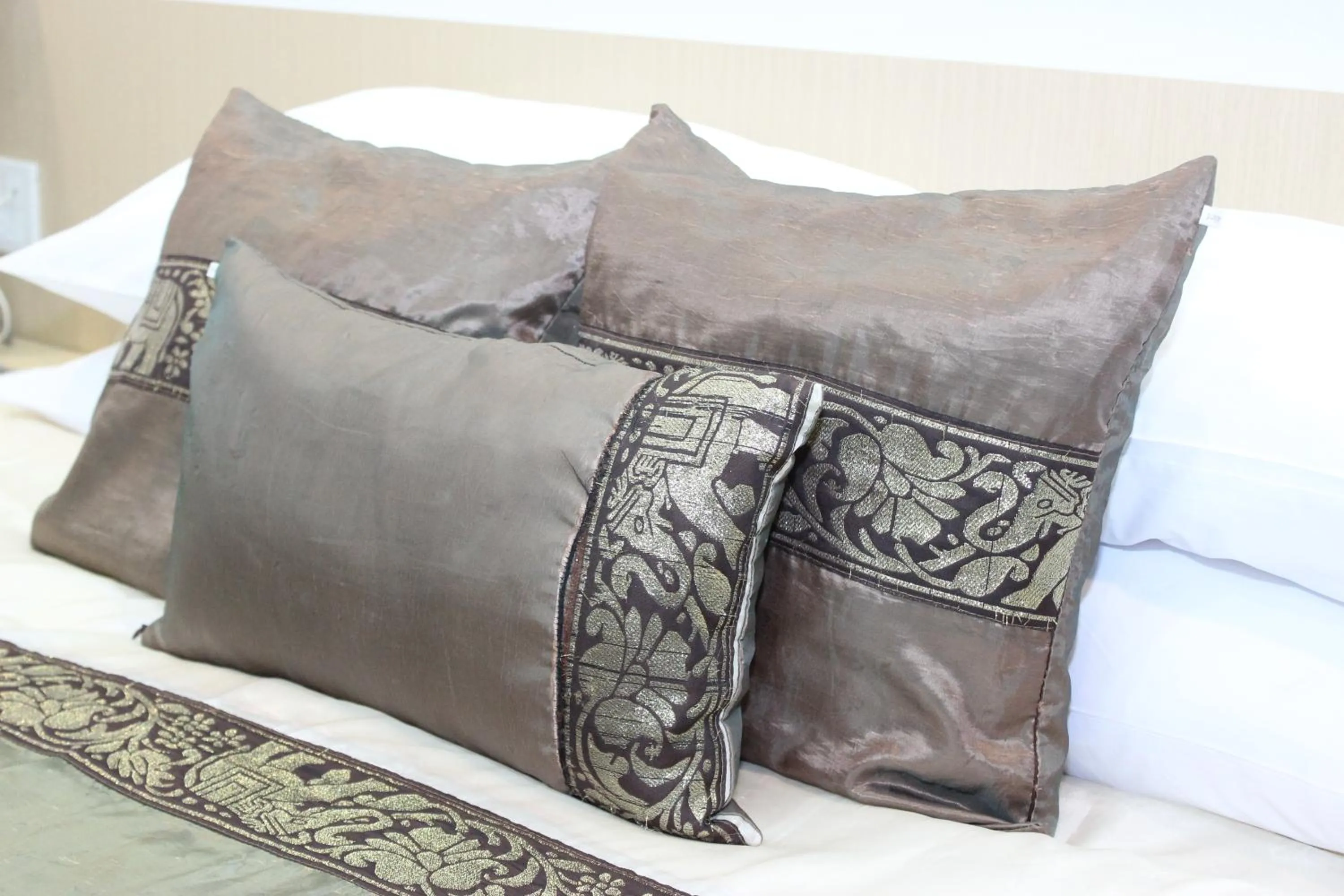 Bed in Charoen Hotel