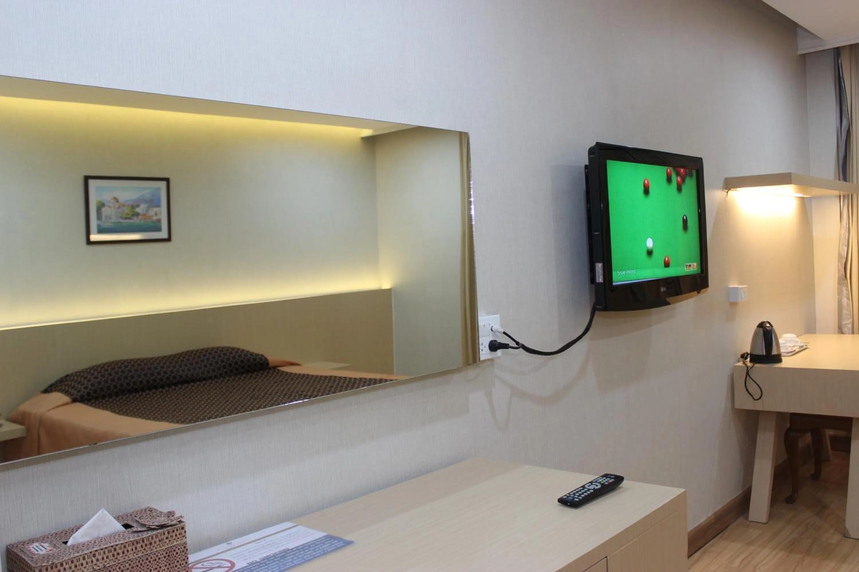 Bed in Charoen Hotel