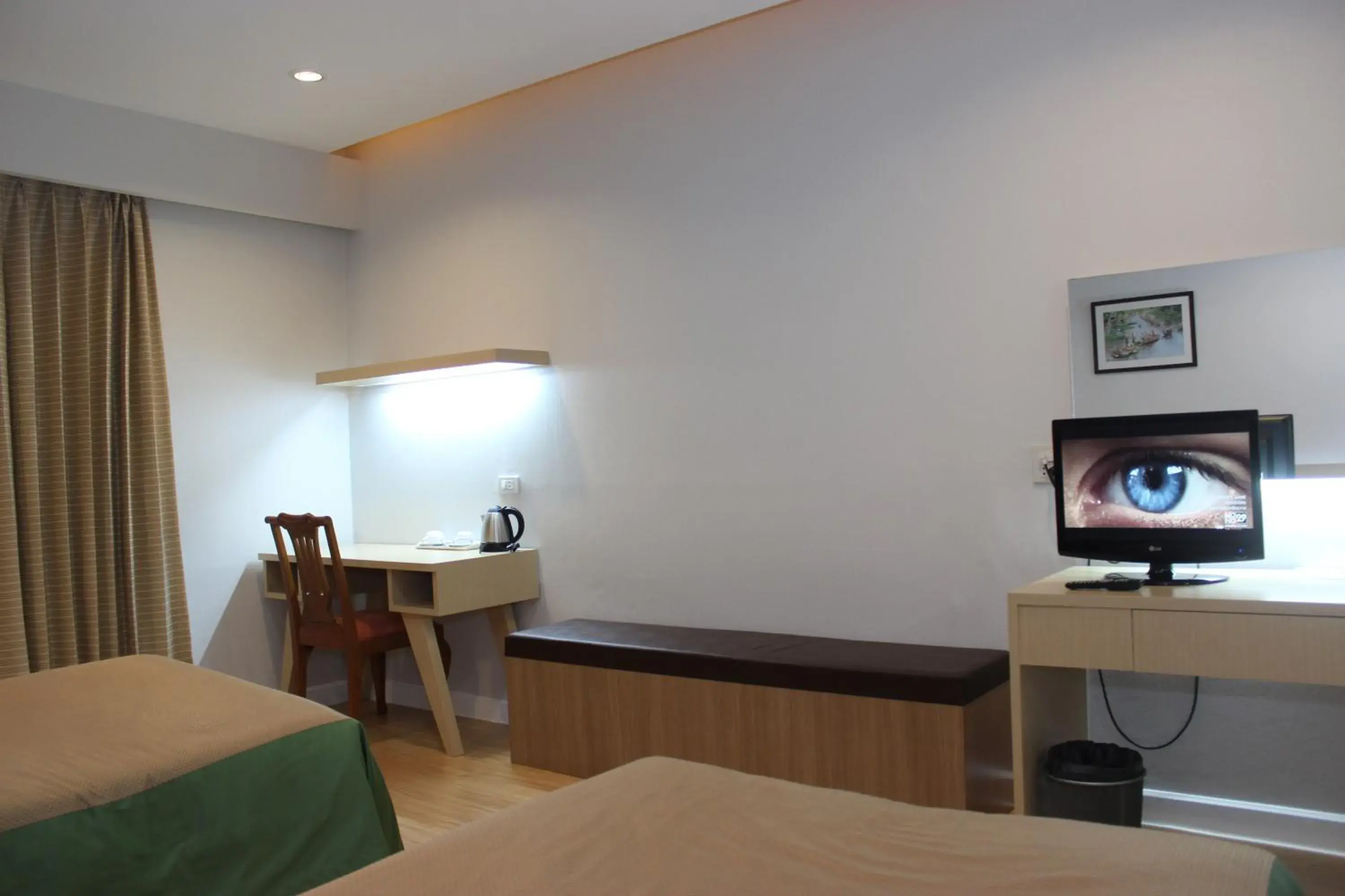 Bed in Charoen Hotel Bed in Charoen Hotel