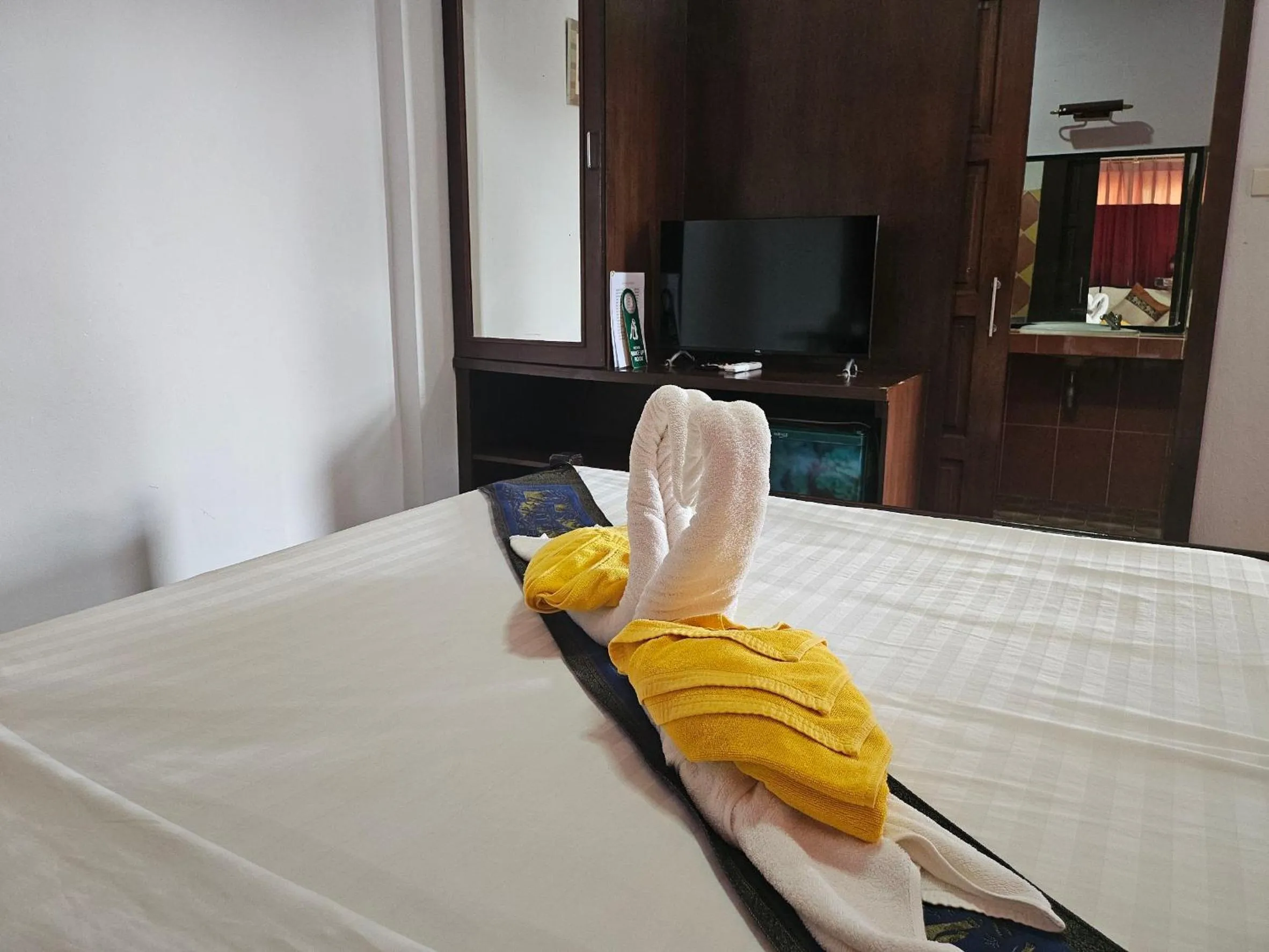 Bed in Rin Beach Resort