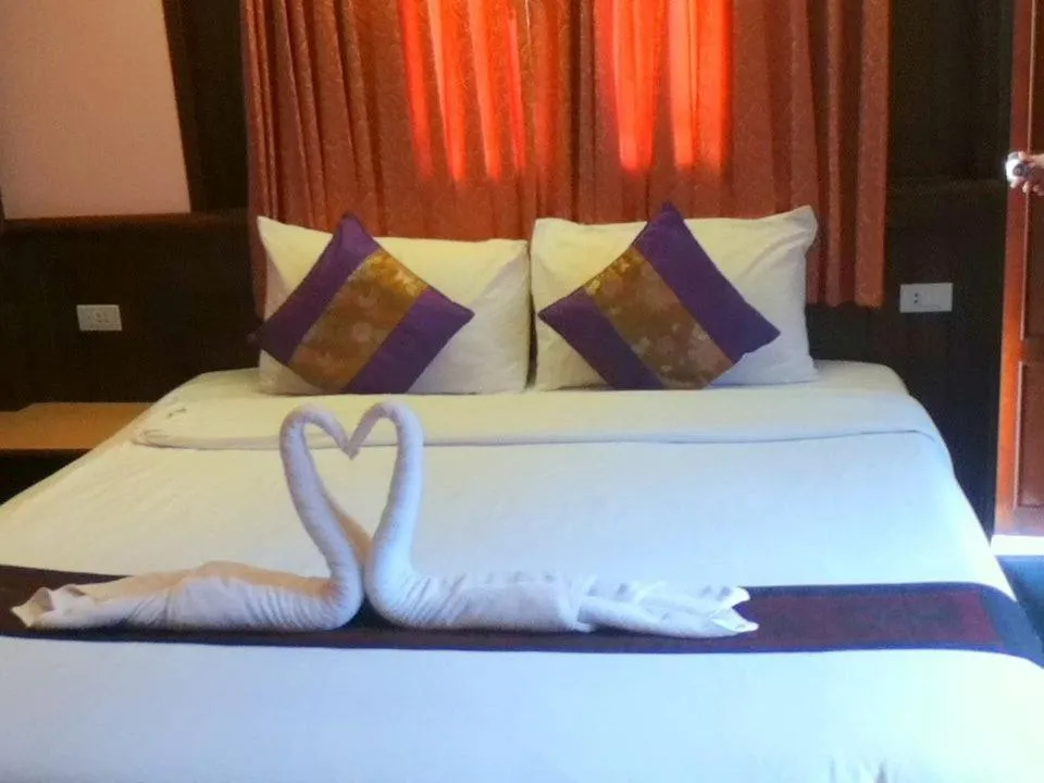 Bed in Rin Beach Resort