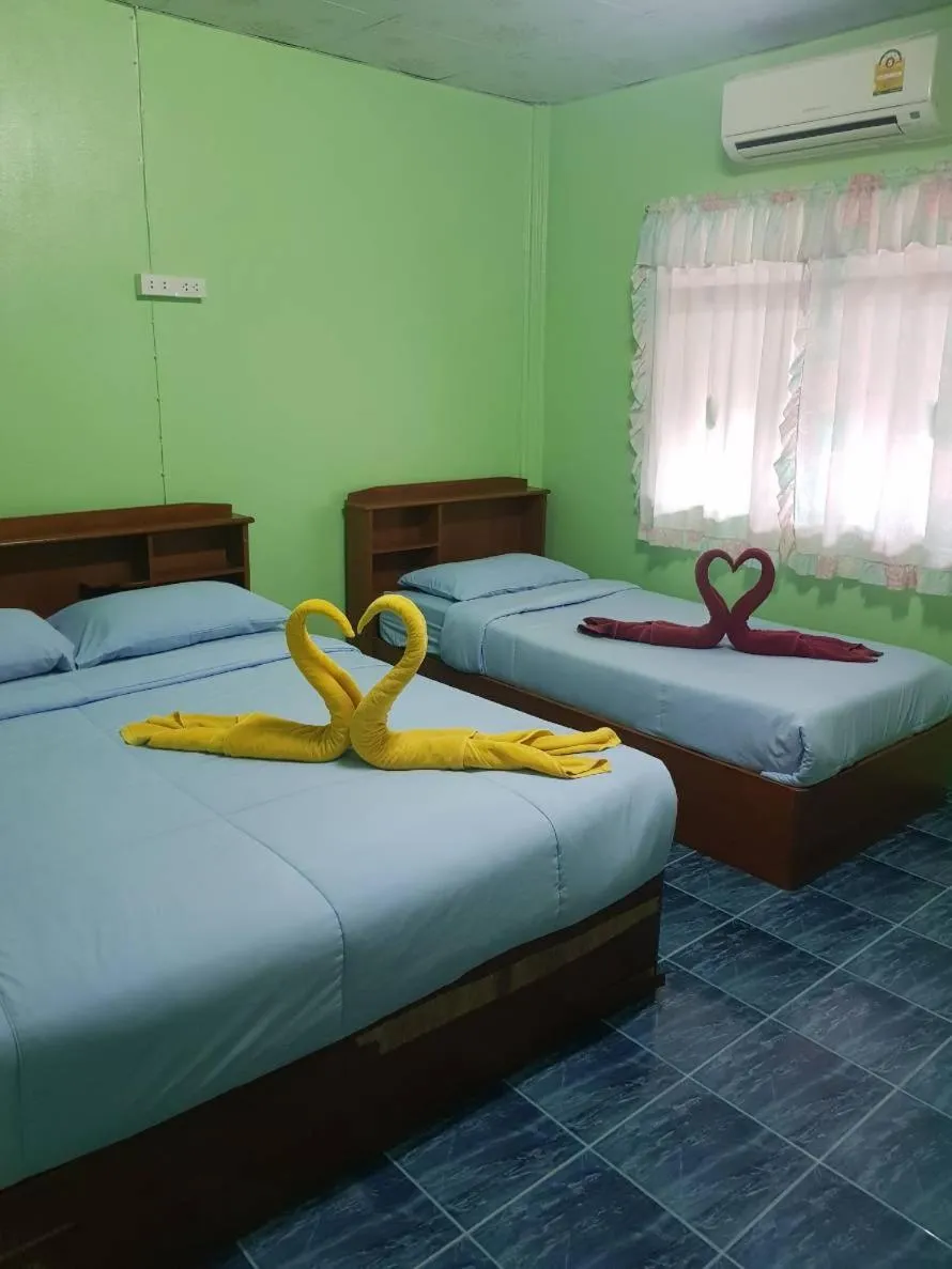 Bed in Rin Beach Resort