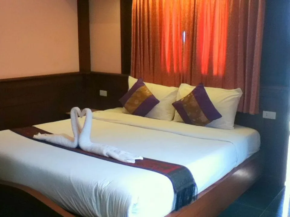 Bed in Rin Beach Resort