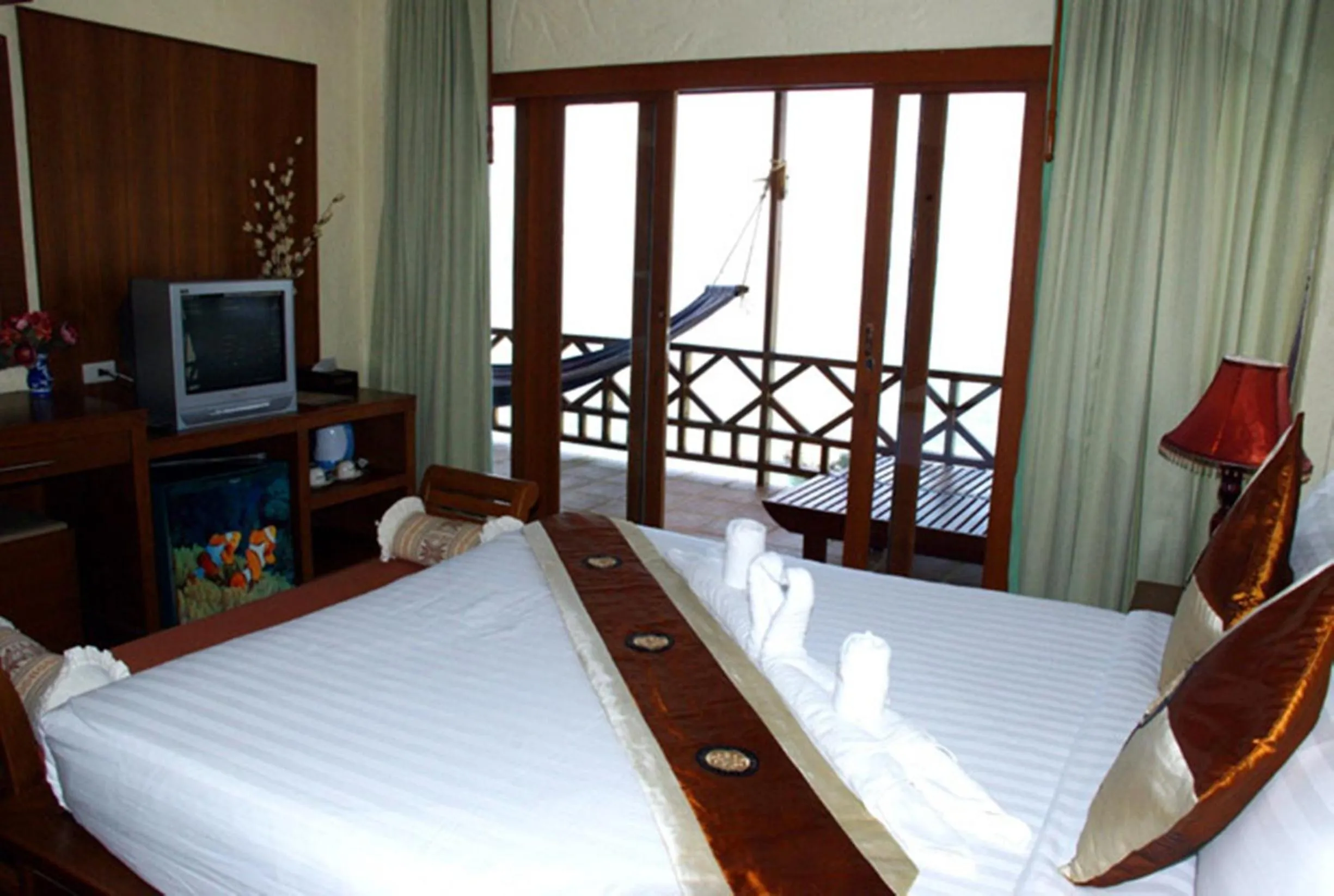 Bed in Rin Beach Resort