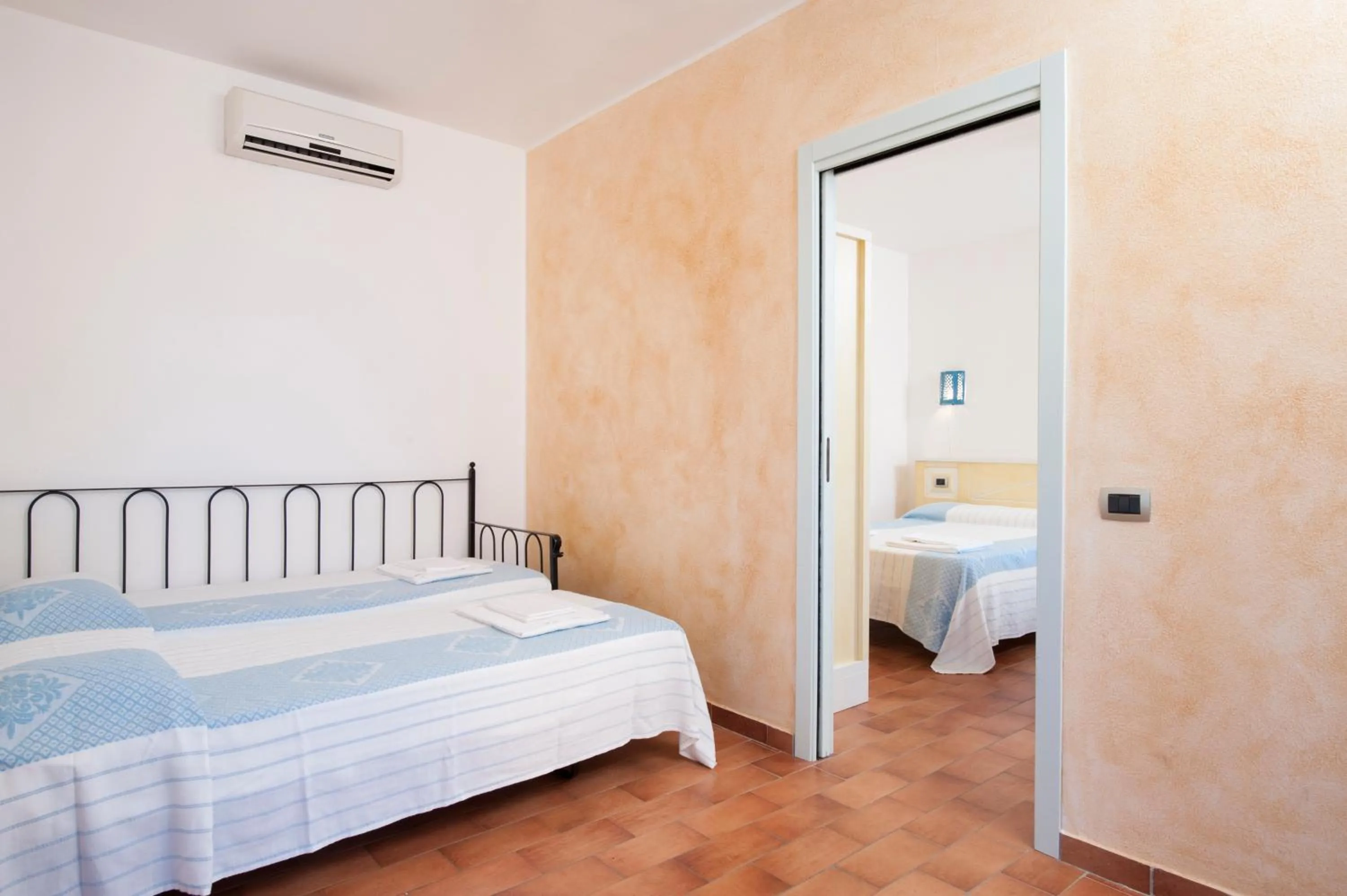 Bed in S'Incantu Resort