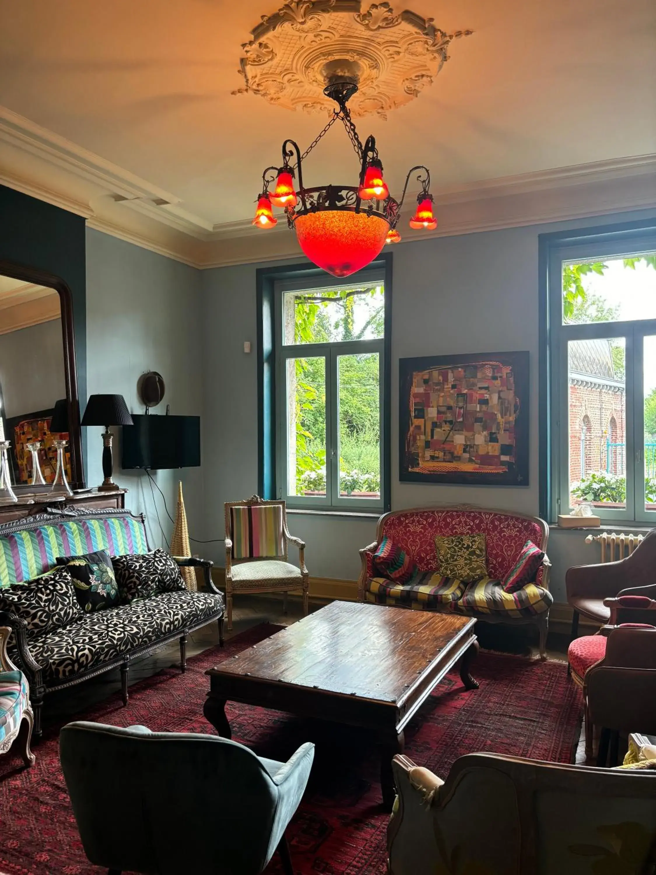 Living room in LOGIS HÔTEL-RESTAURANT - Le Moulin d'Artres Living room in LOGIS HÔTEL-RESTAURANT - Le Moulin d'Artres