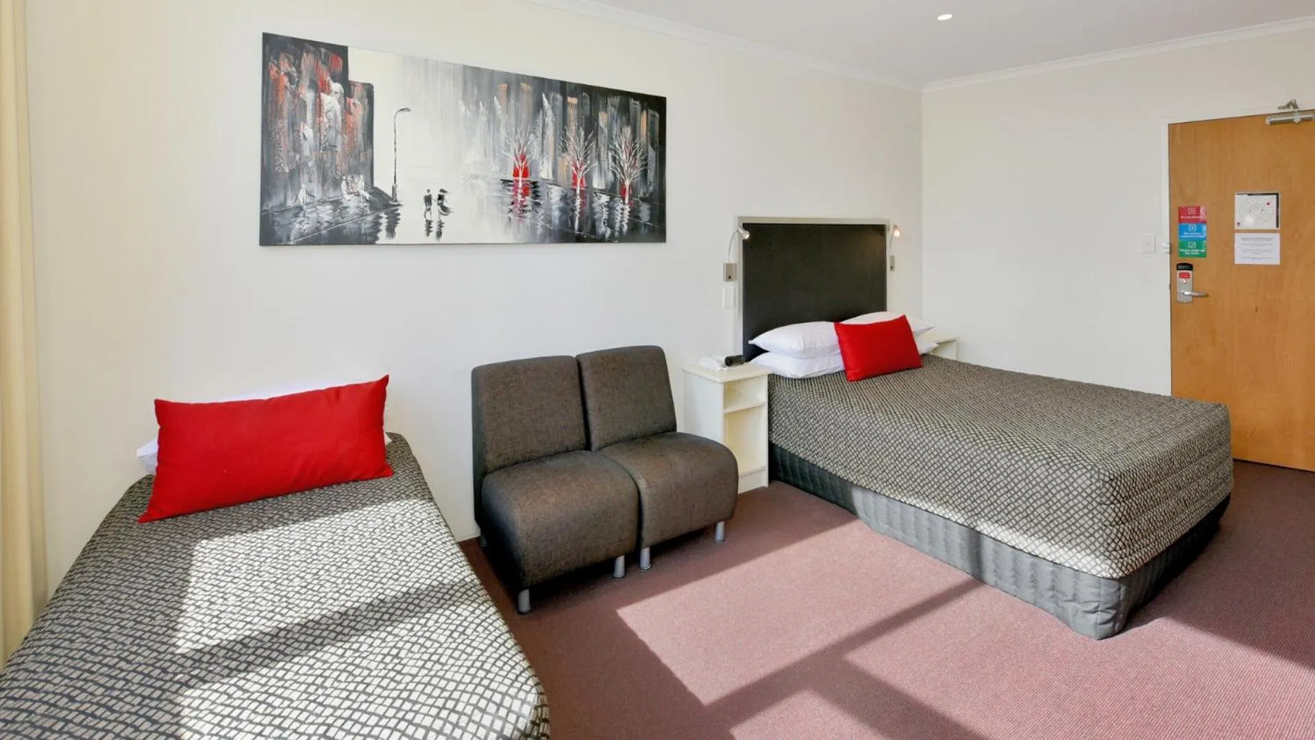 Bed in Atlantic Tower Motor Inn