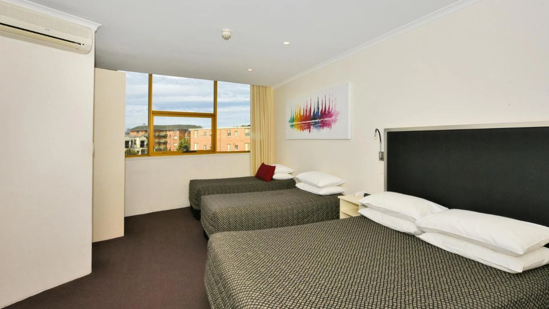 Bed in Atlantic Tower Motor Inn