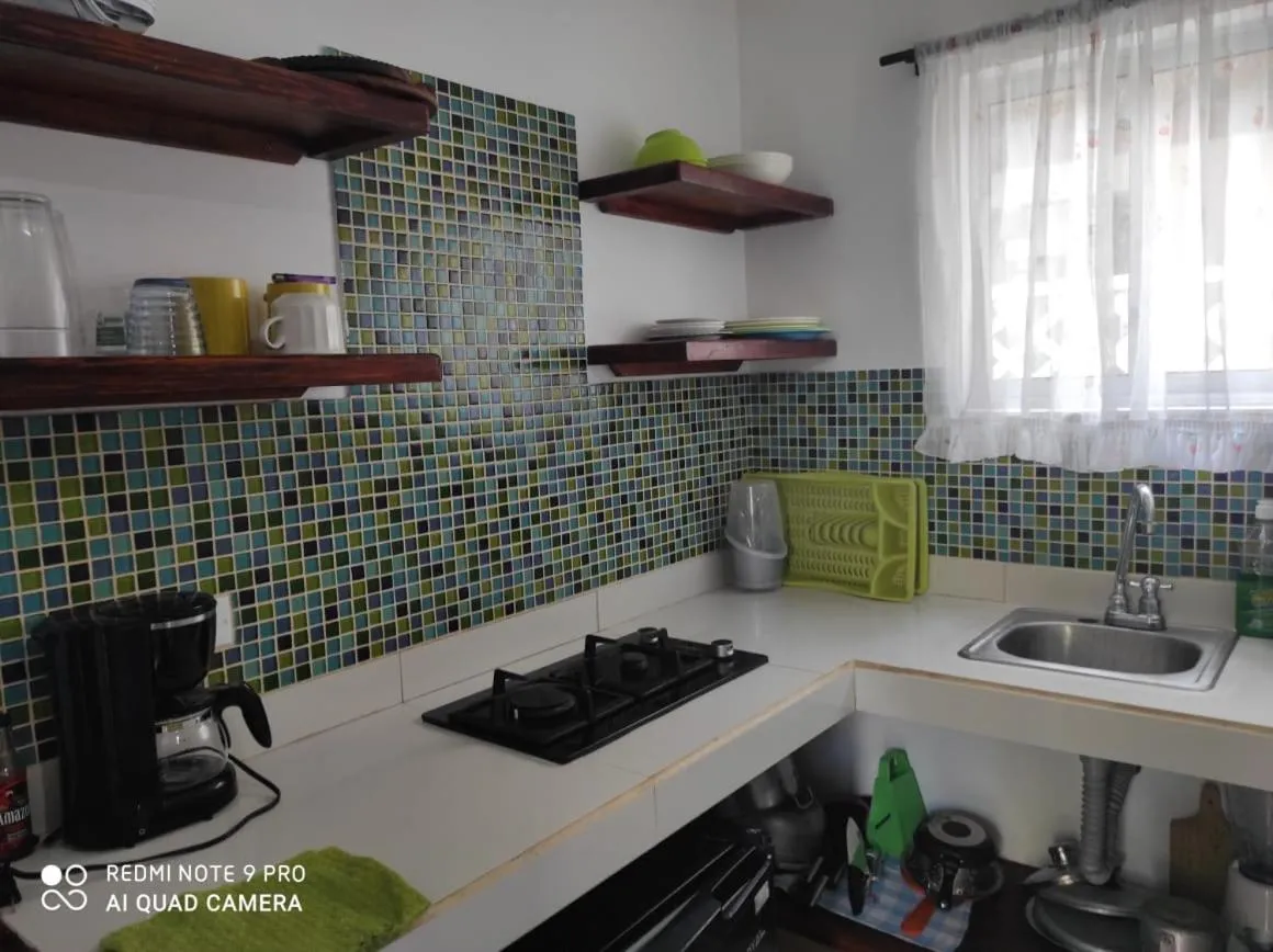 kitchen in Cabañas Green Yard