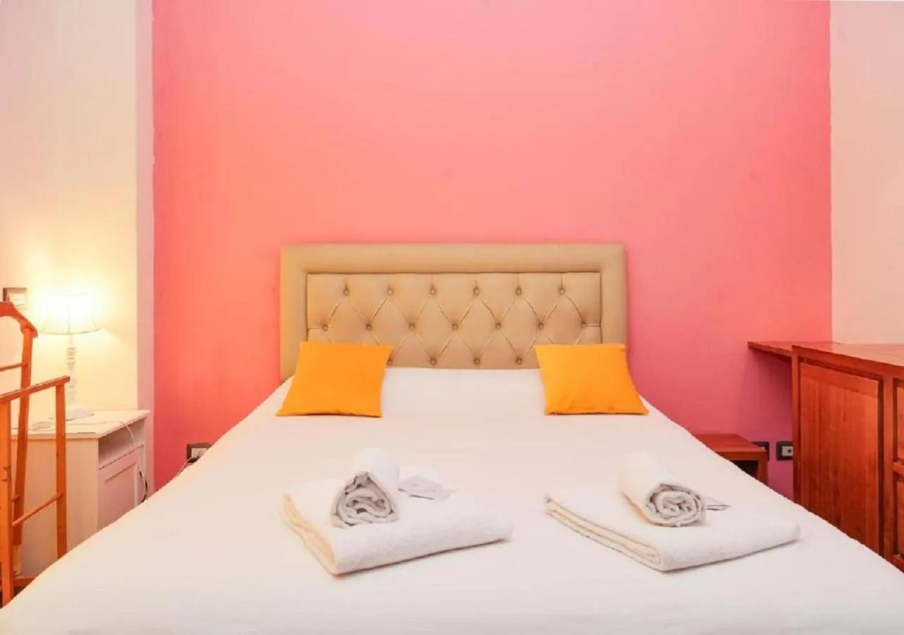 Bed in Aida Charming Rooms