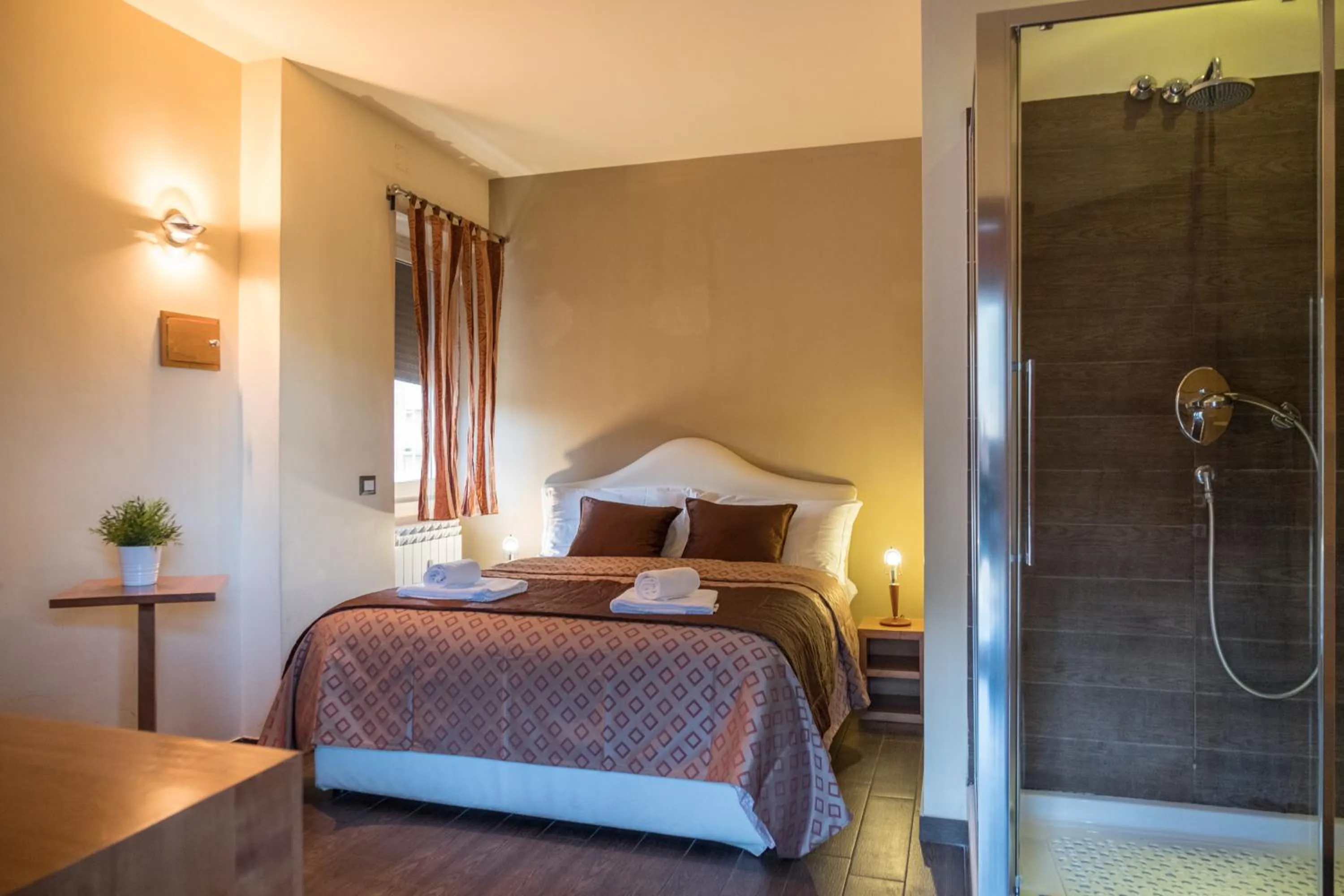 Shower, Bed in Aida Charming Rooms