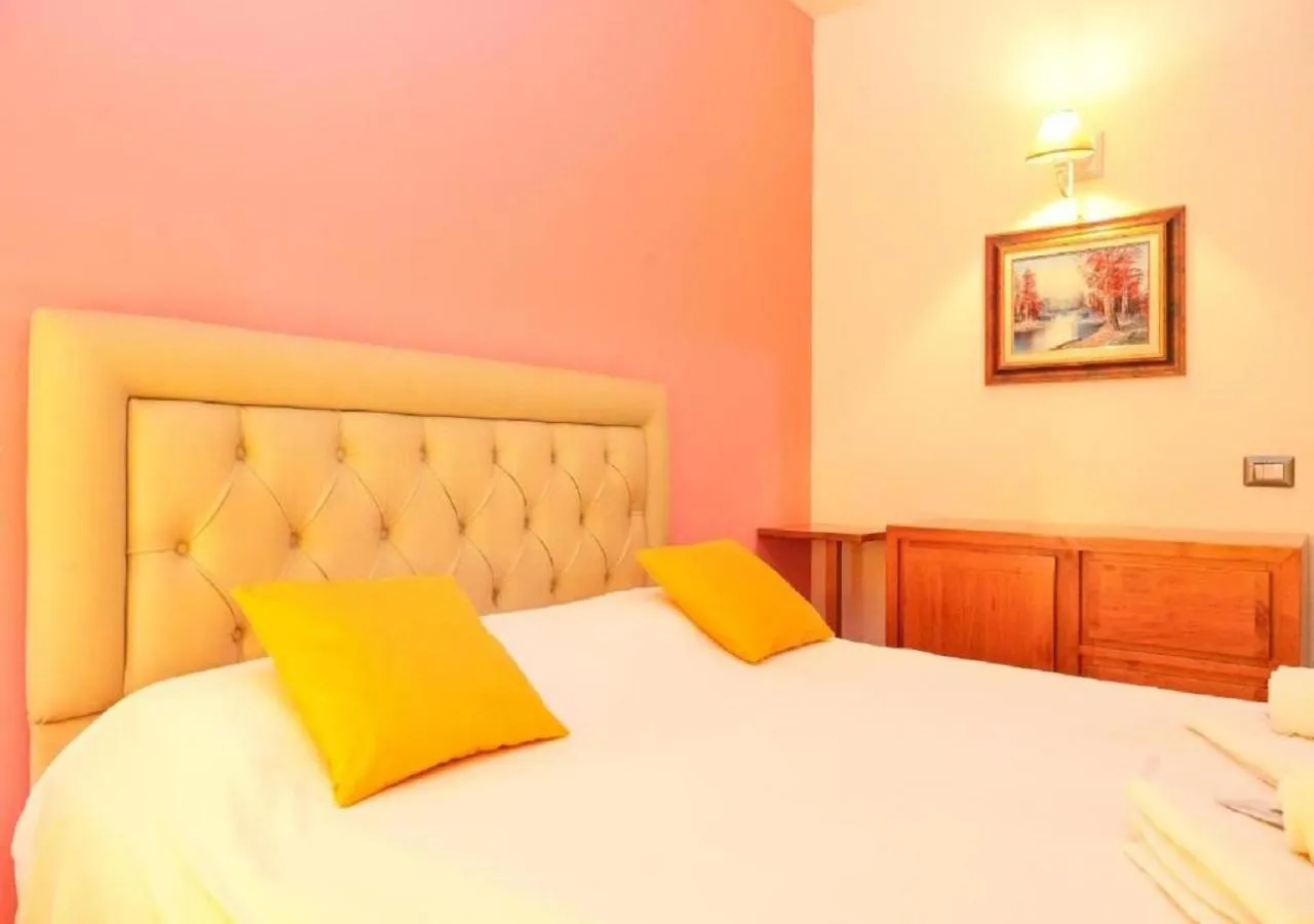 Bed in Aida Charming Rooms