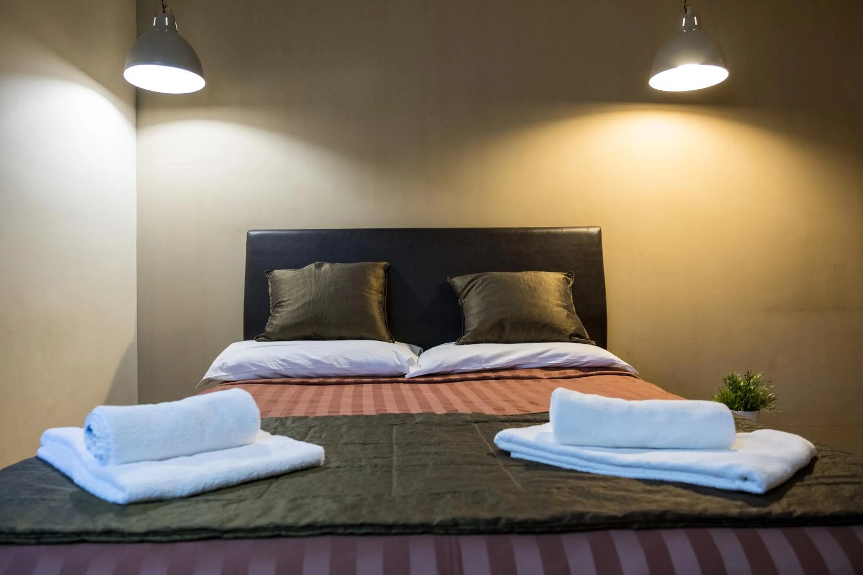 Bed in Aida Charming Rooms