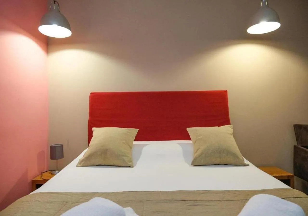 Bed in Aida Charming Rooms