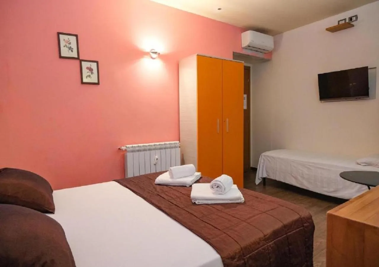 Bed in Aida Charming Rooms