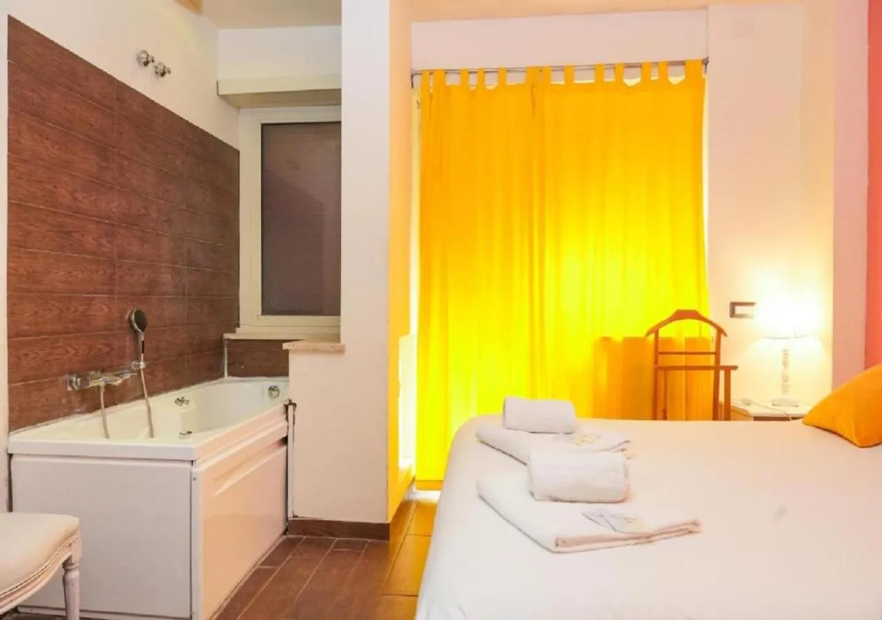 Bed in Aida Charming Rooms