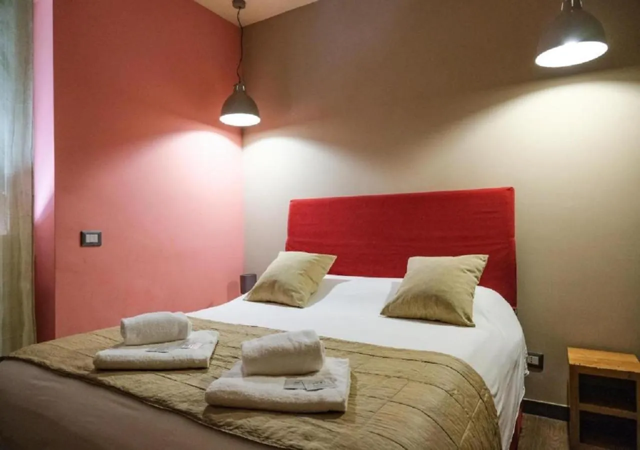 Bed in Aida Charming Rooms