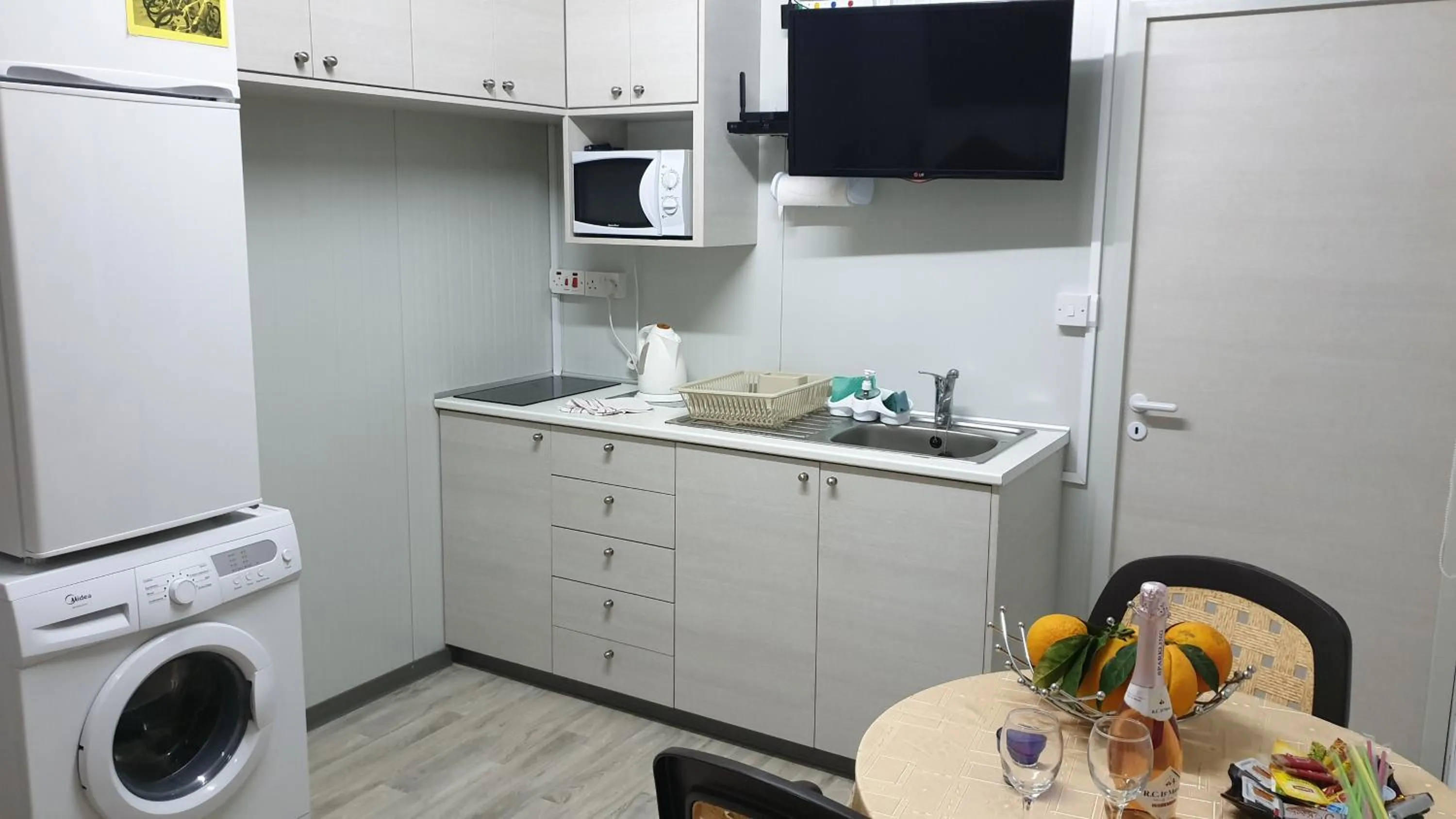 Kitchen or kitchenette in Astrofegia Apartments Near The Sea