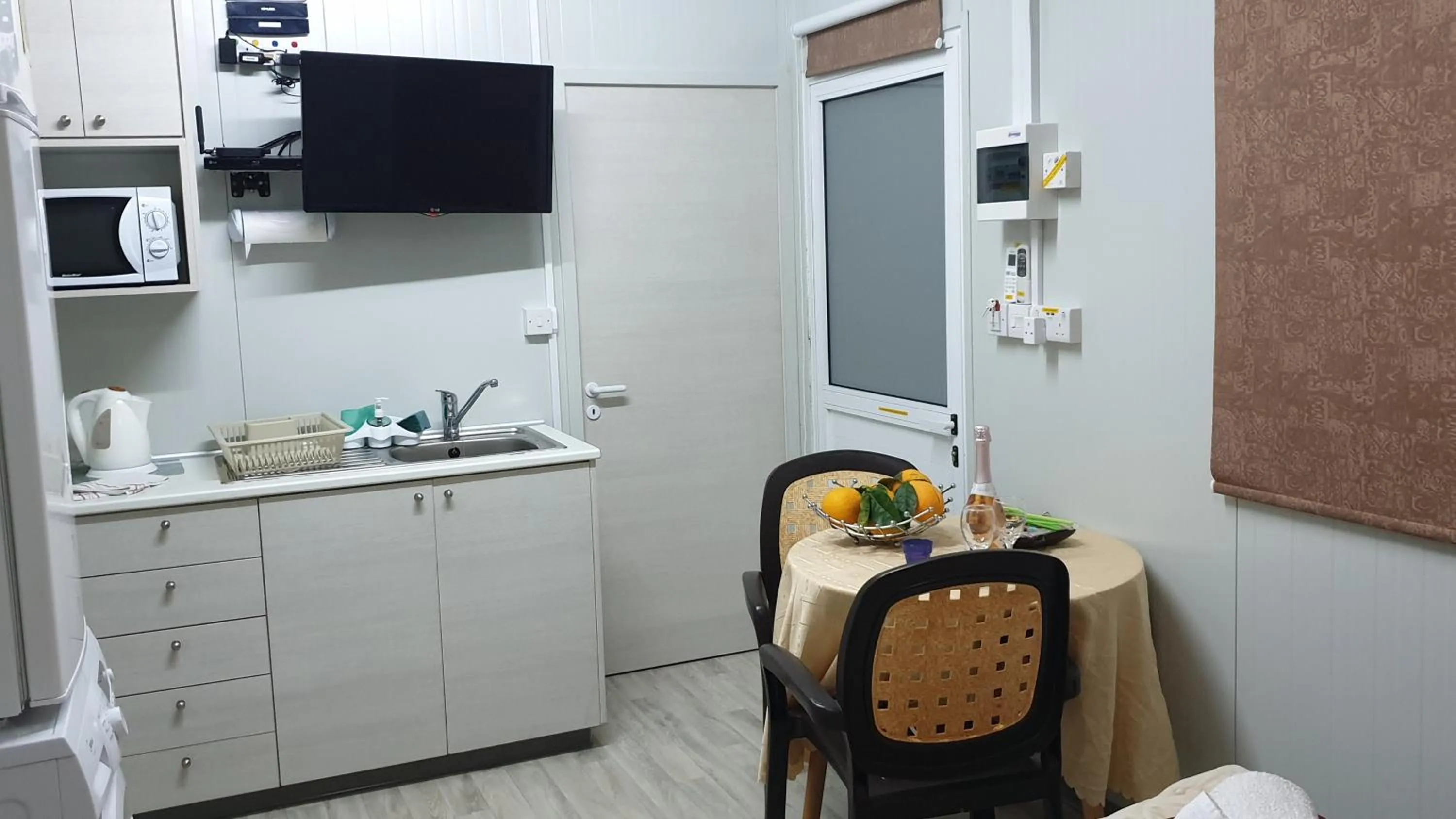 Kitchen or kitchenette in Astrofegia Apartments Near The Sea