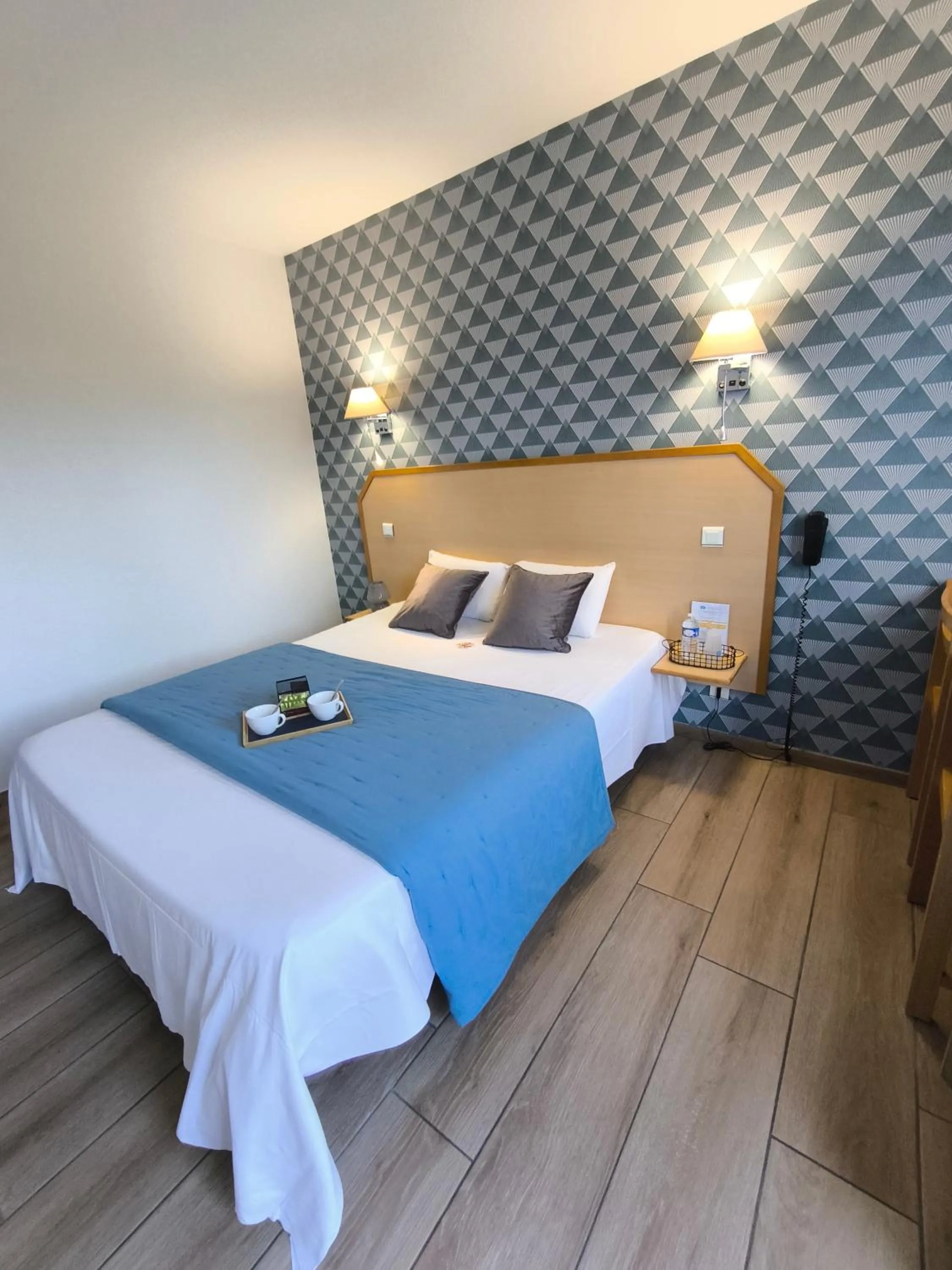 Bed in Hôtel Le Laury's-hôtel calme proche de Rodez avec parking privé gratuit