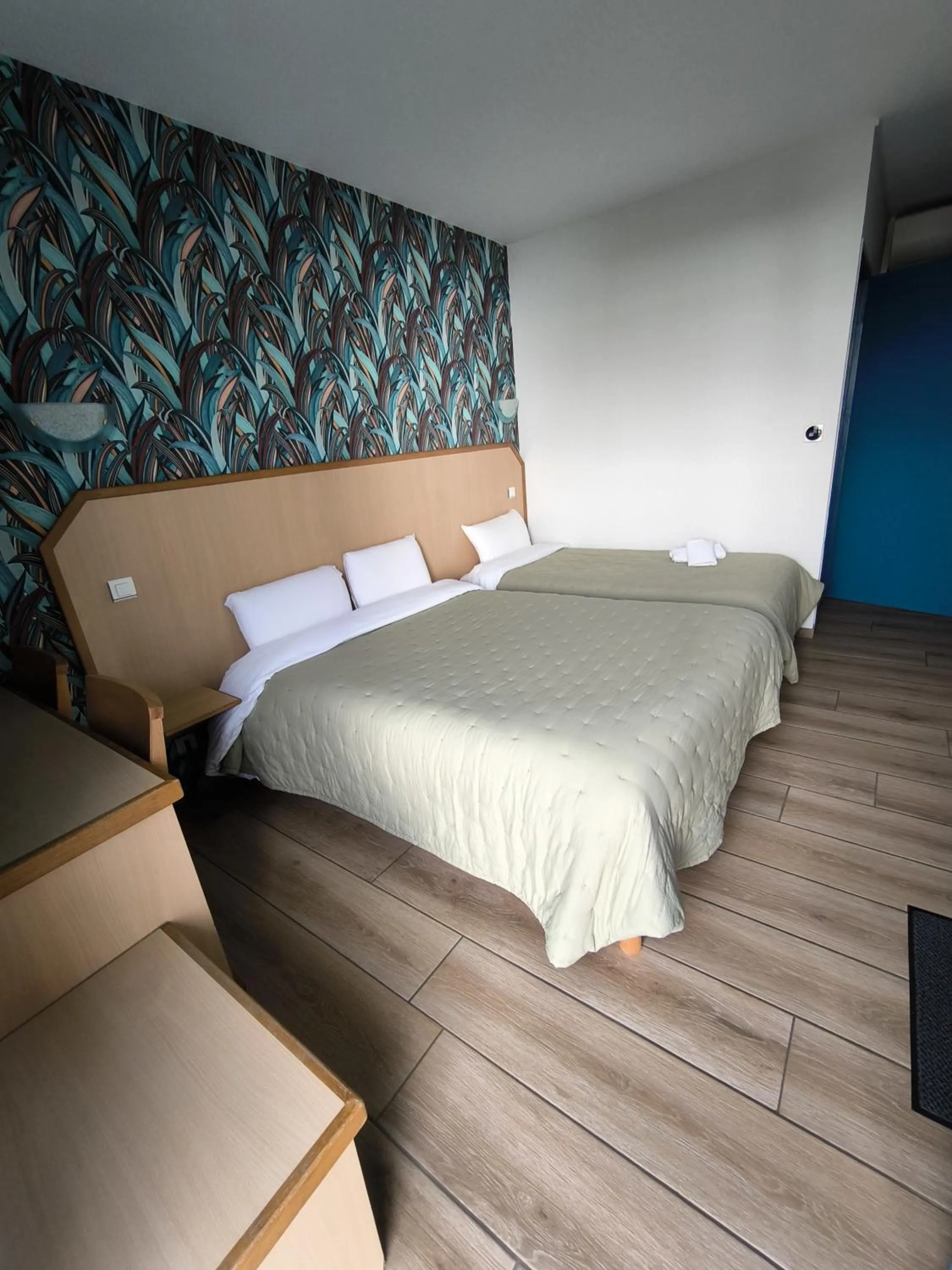 Photo of the whole room, Bed in Hôtel Le Laury's