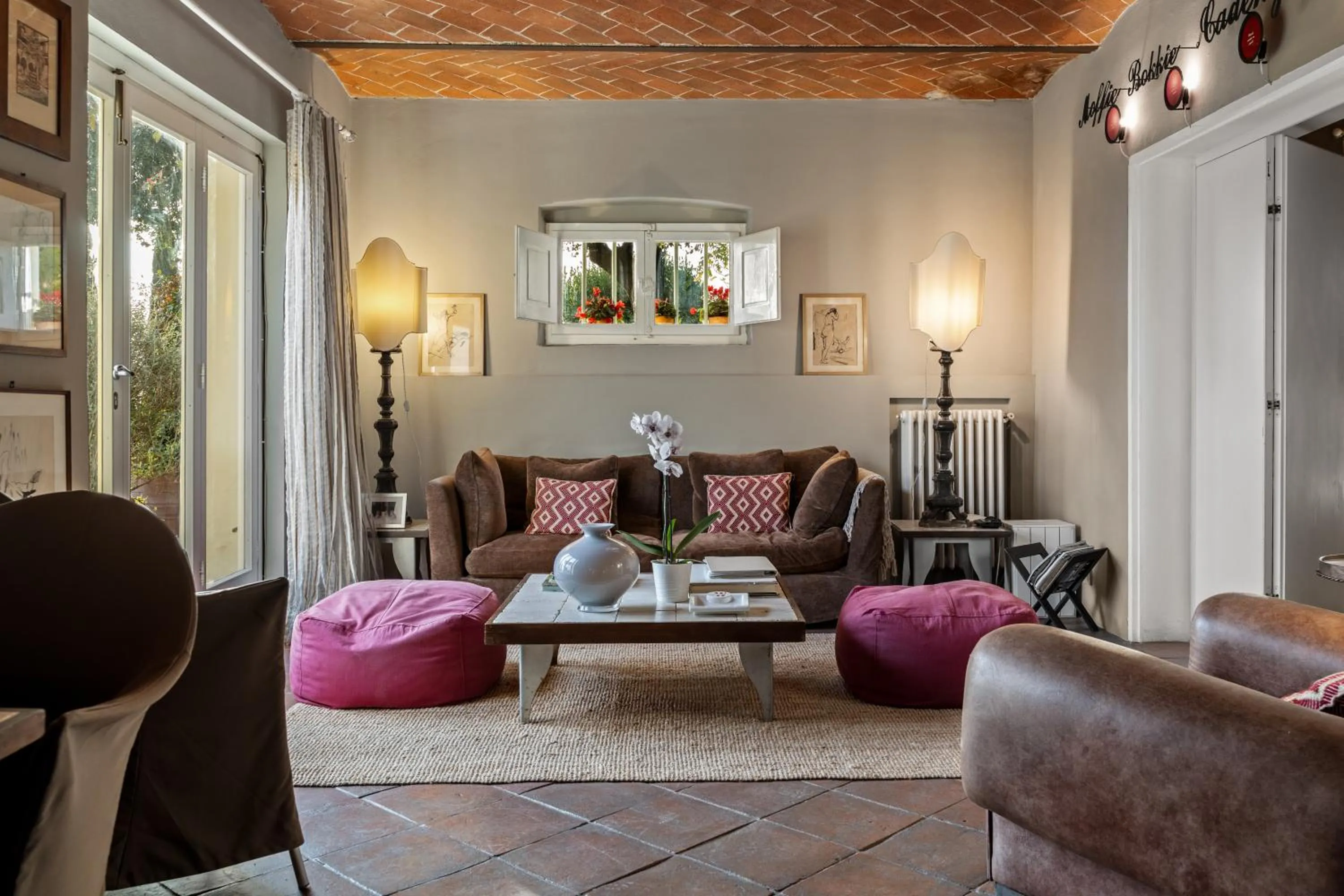 Communal lounge/ TV room in Fontelunga Hotel & Villas