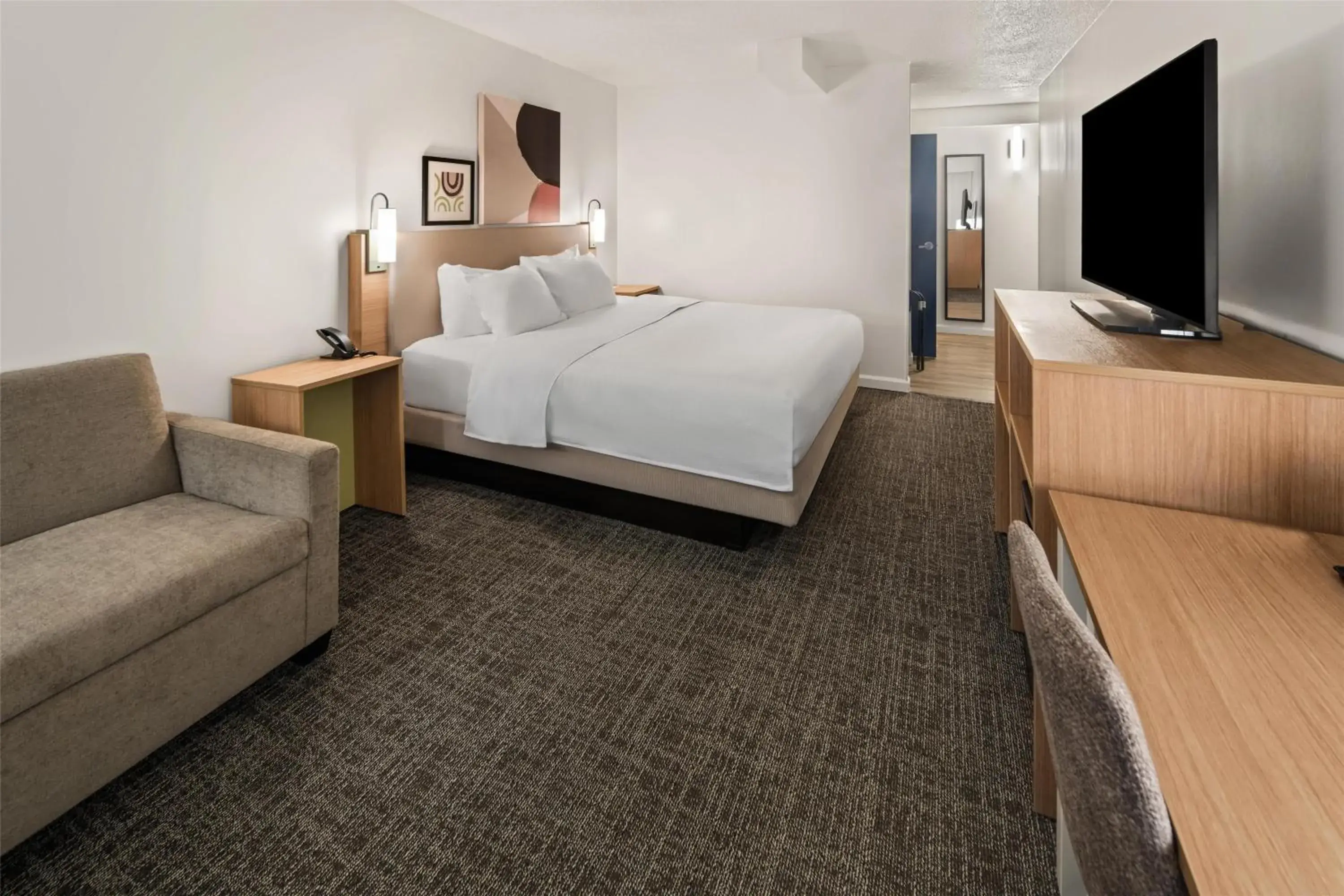 Living room, Bed in Spark by Hilton Waldorf Living room, Bed in Spark by Hilton Waldorf