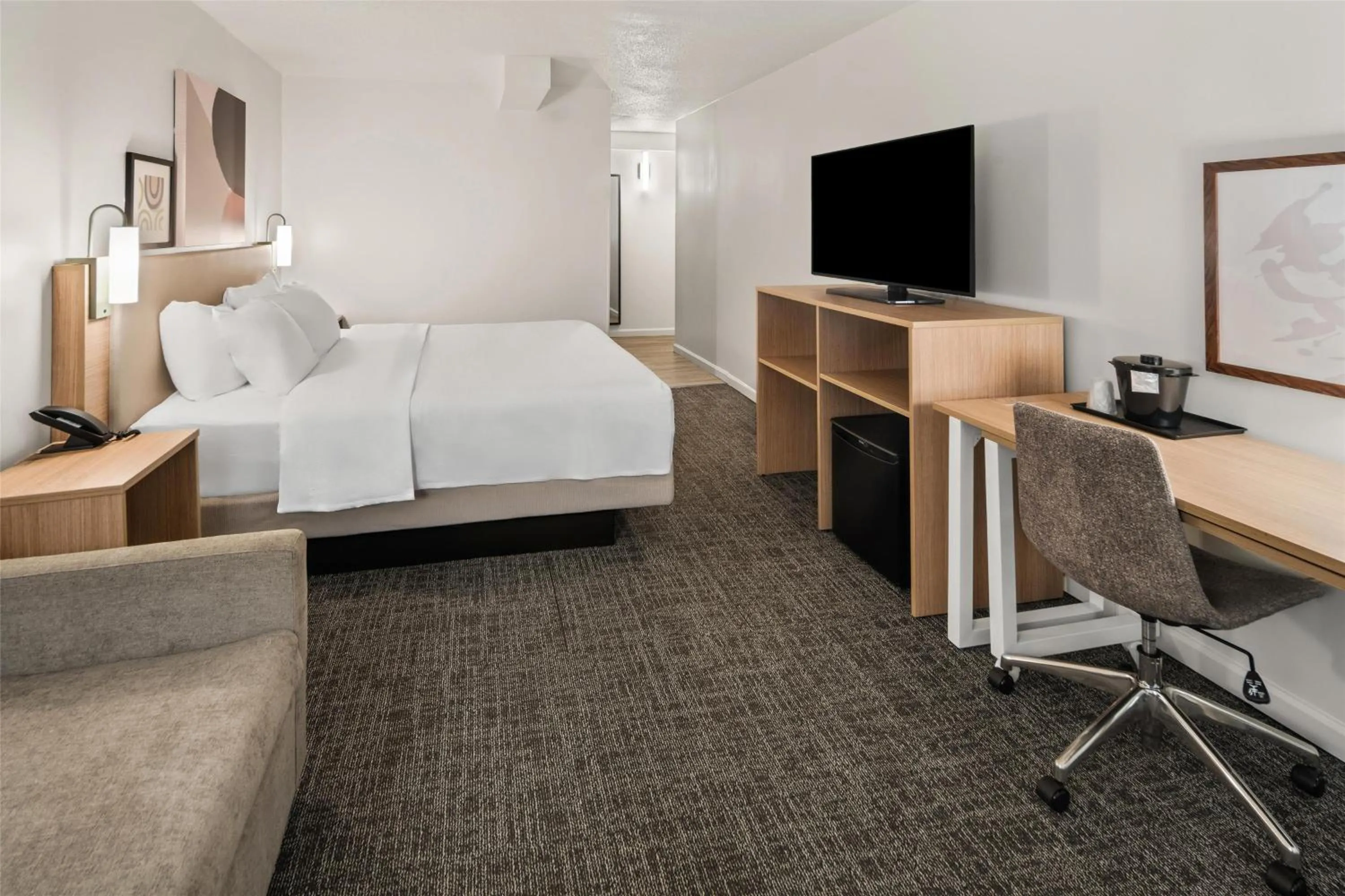 Living room, Bed in Spark by Hilton Waldorf