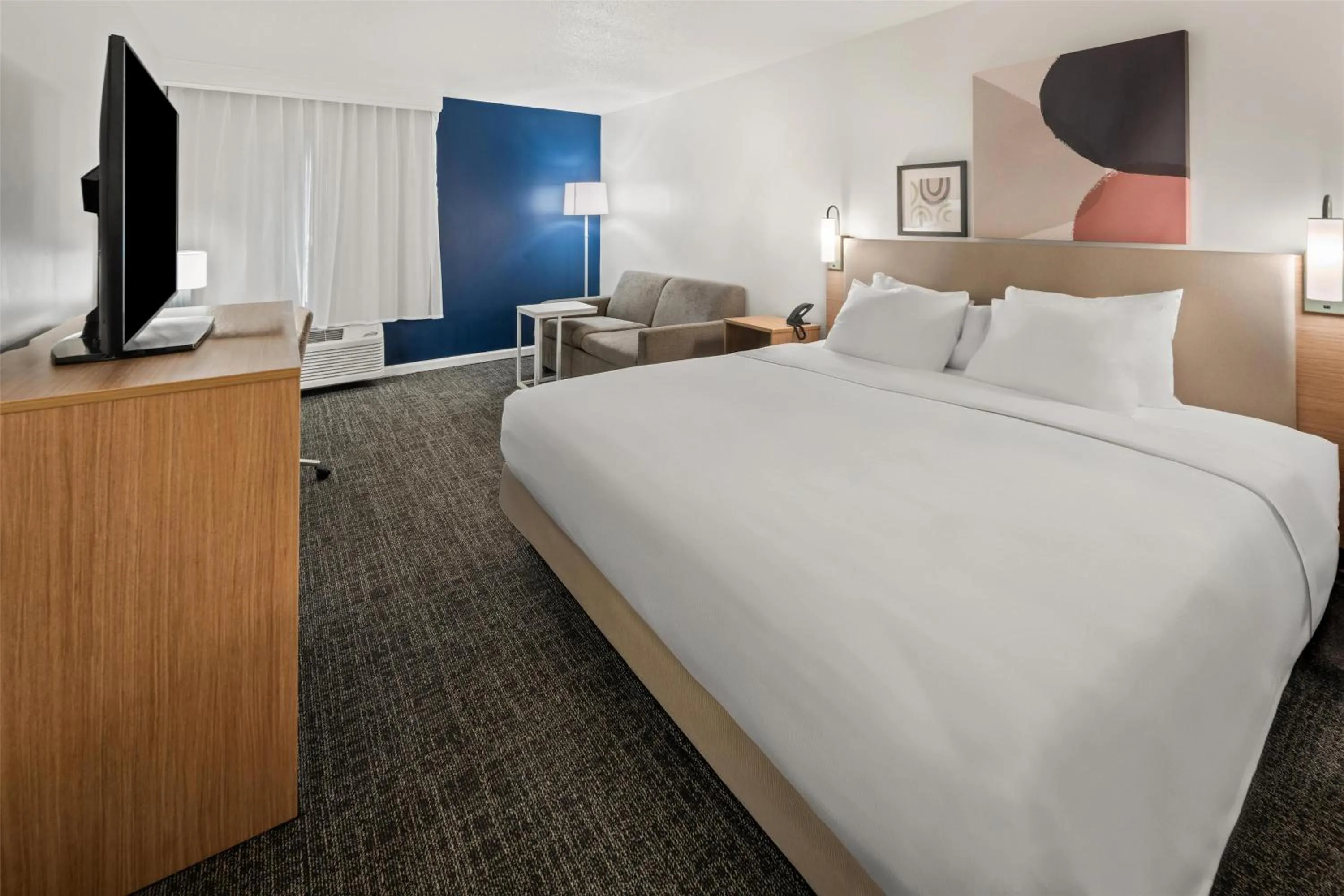 Living room, Bed in Spark by Hilton Waldorf