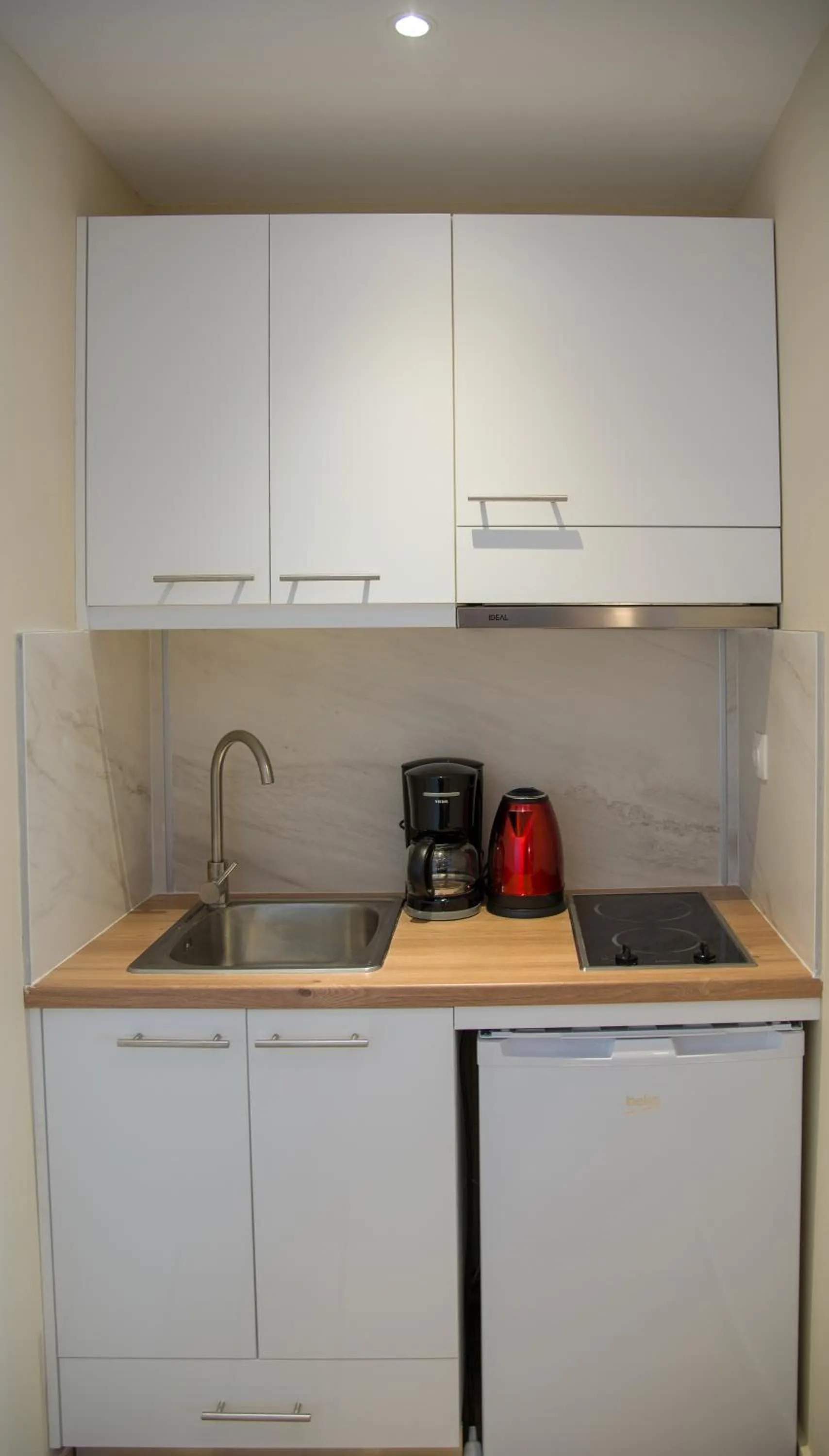 Kitchen or kitchenette in Elma Suites