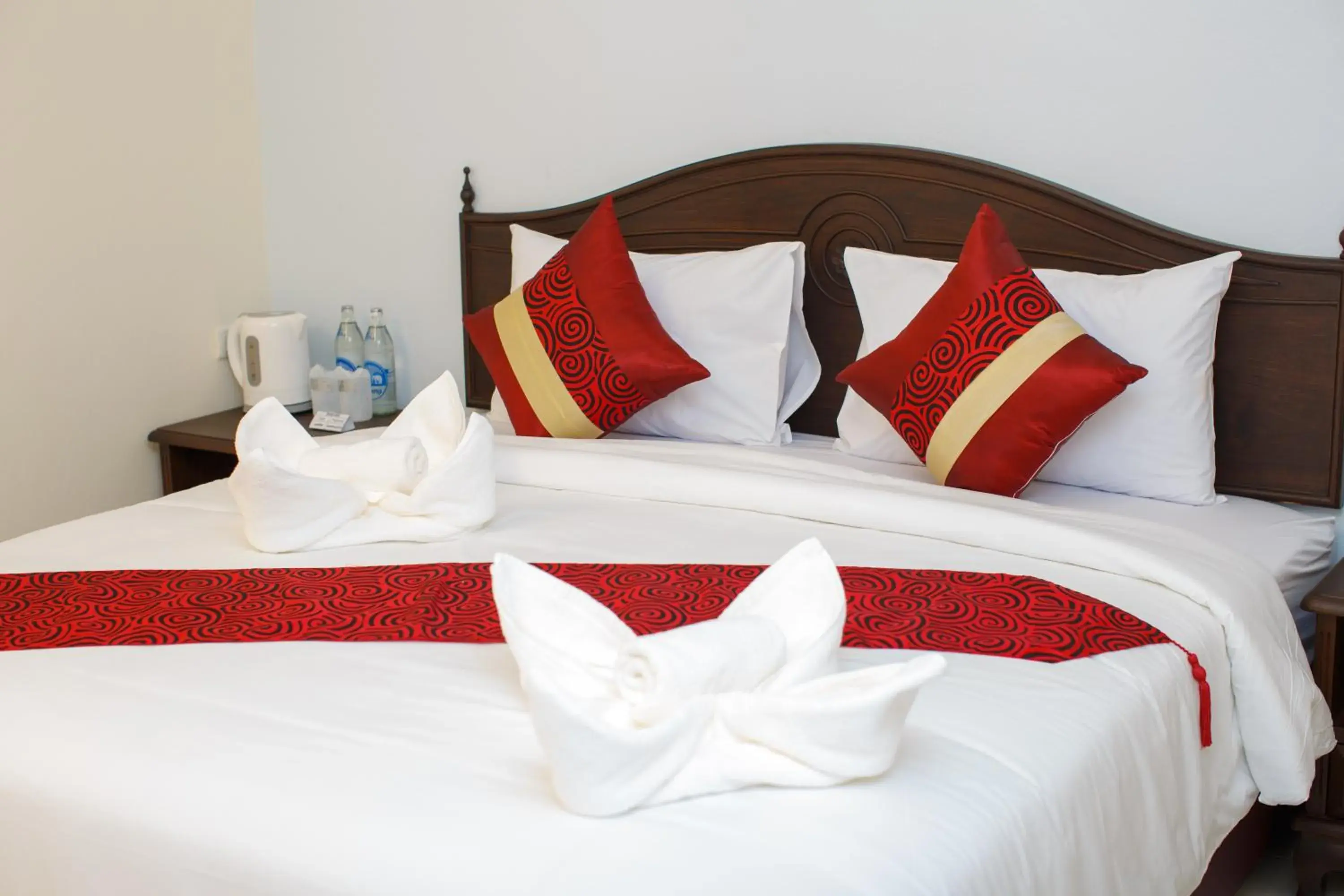 Bed in Chang Siam Inn Bed in Chang Siam Inn