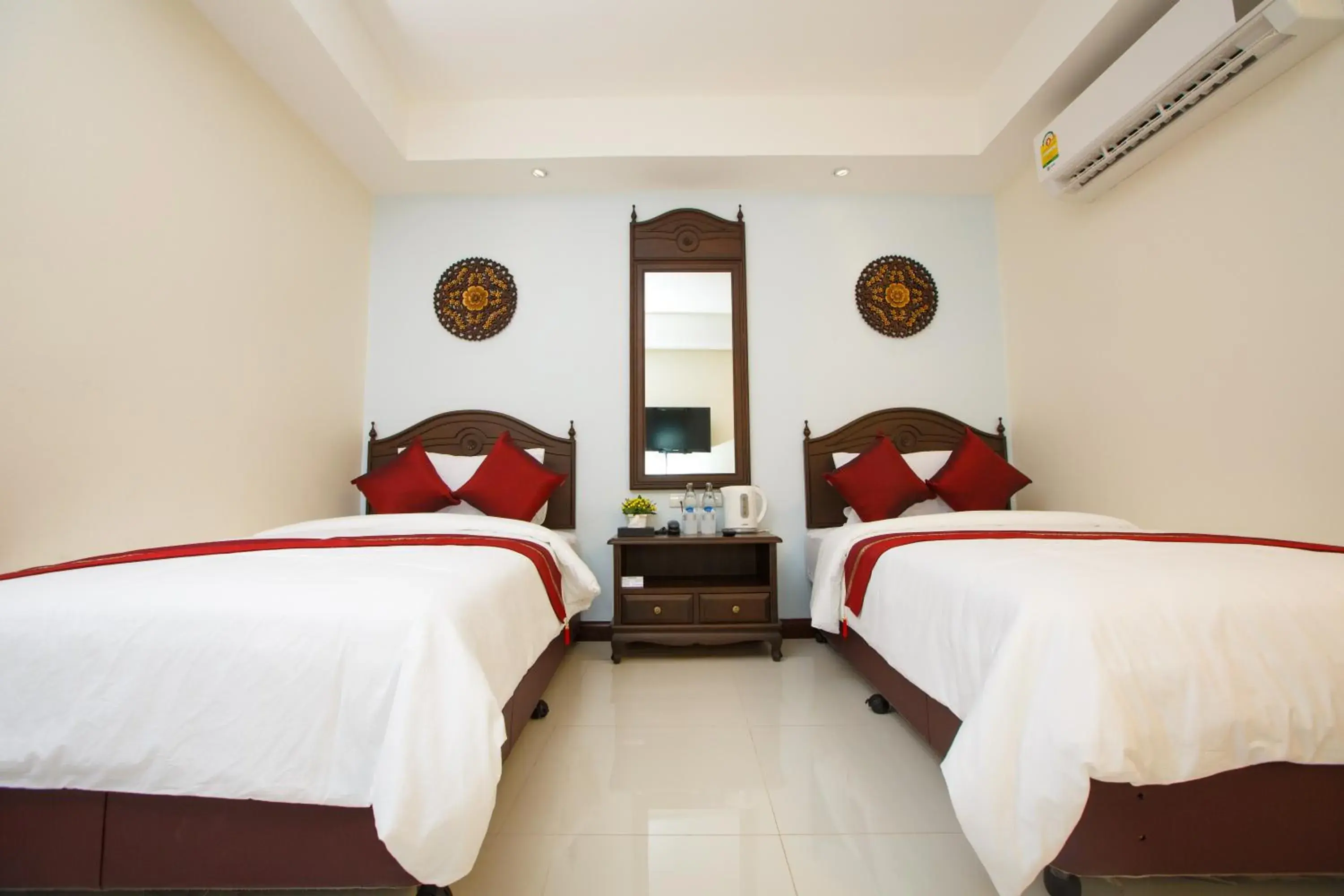 Bed in Chang Siam Inn Bed in Chang Siam Inn