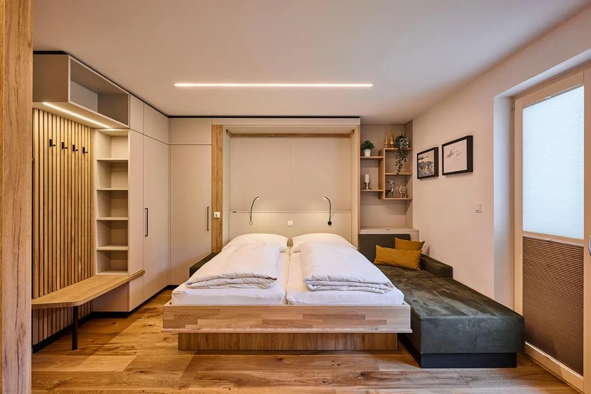 Bed in Appartements Täli