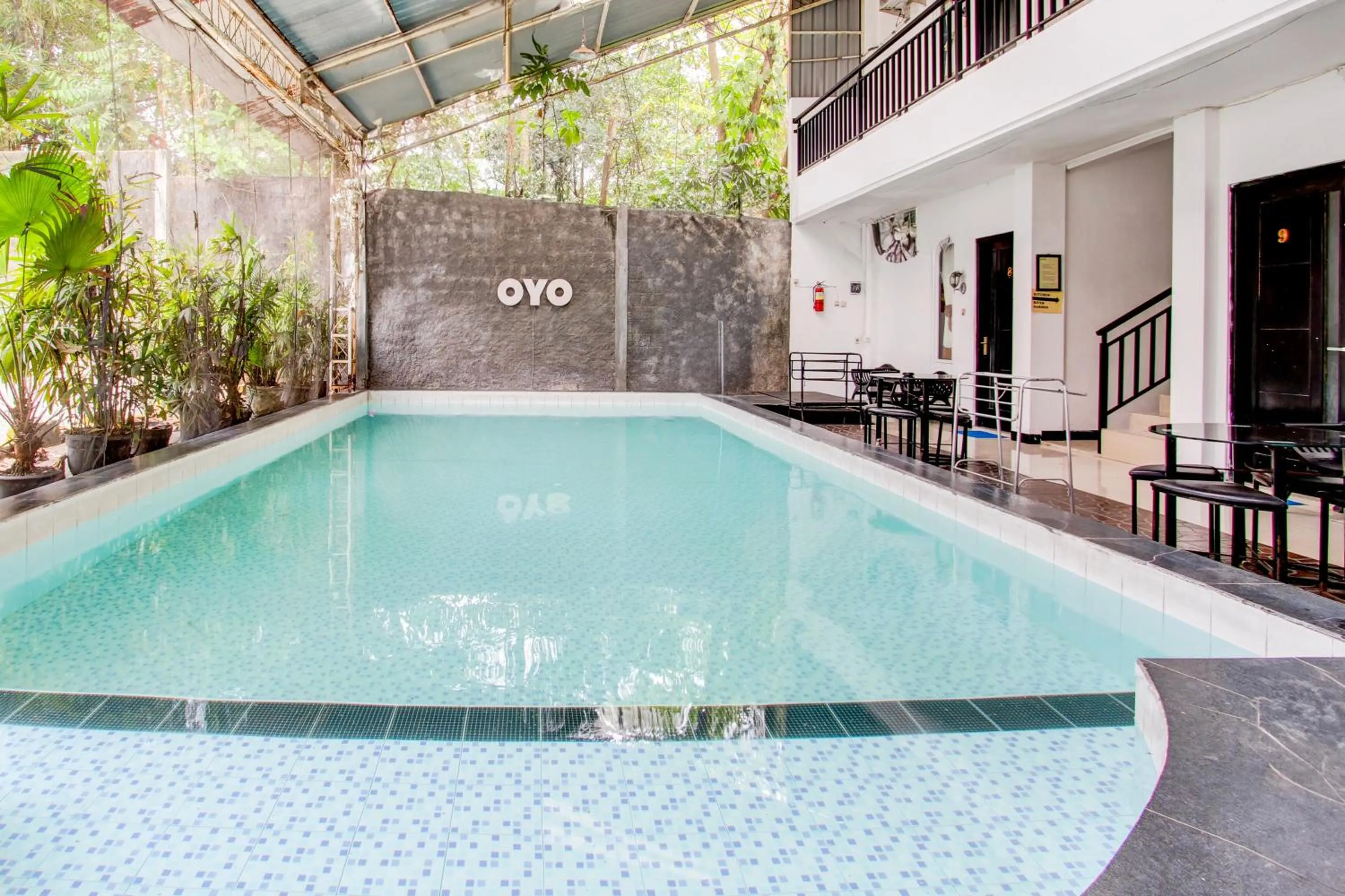 Swimming pool in Hotel O Pondok Helomi