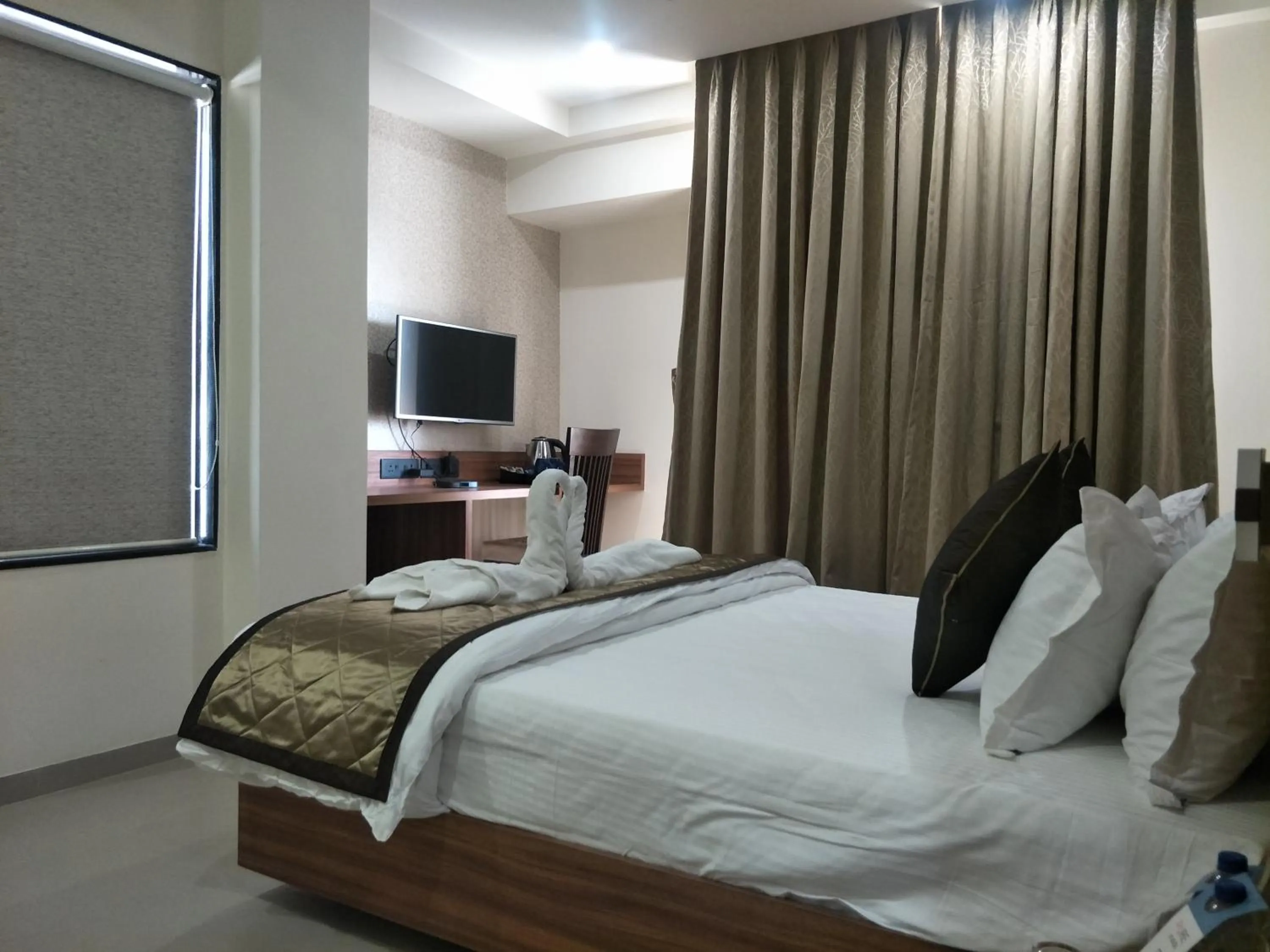 Bed in Kyriad Hotel Solapur by OTHPL