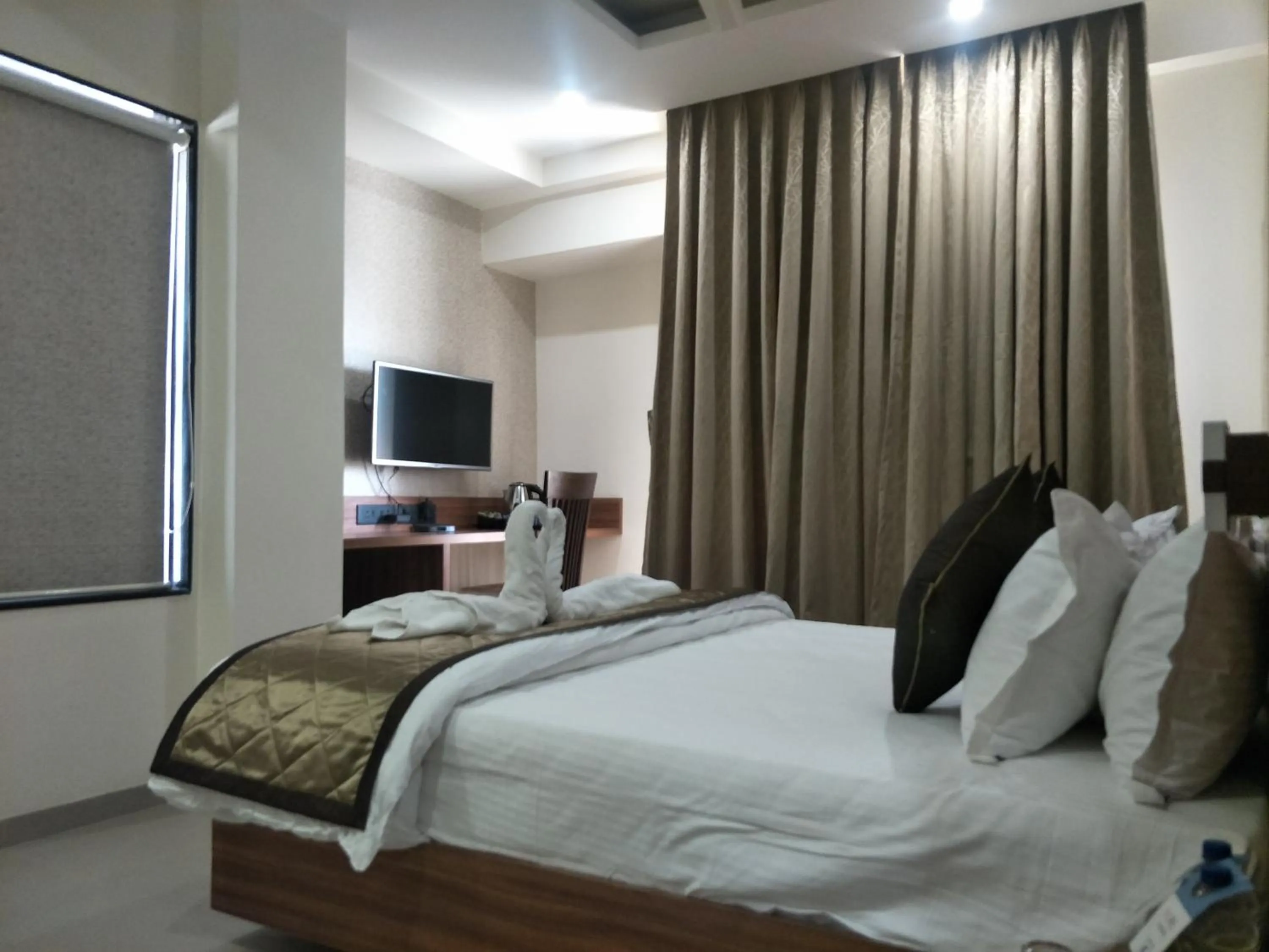 Bed in Kyriad Hotel Solapur by OTHPL