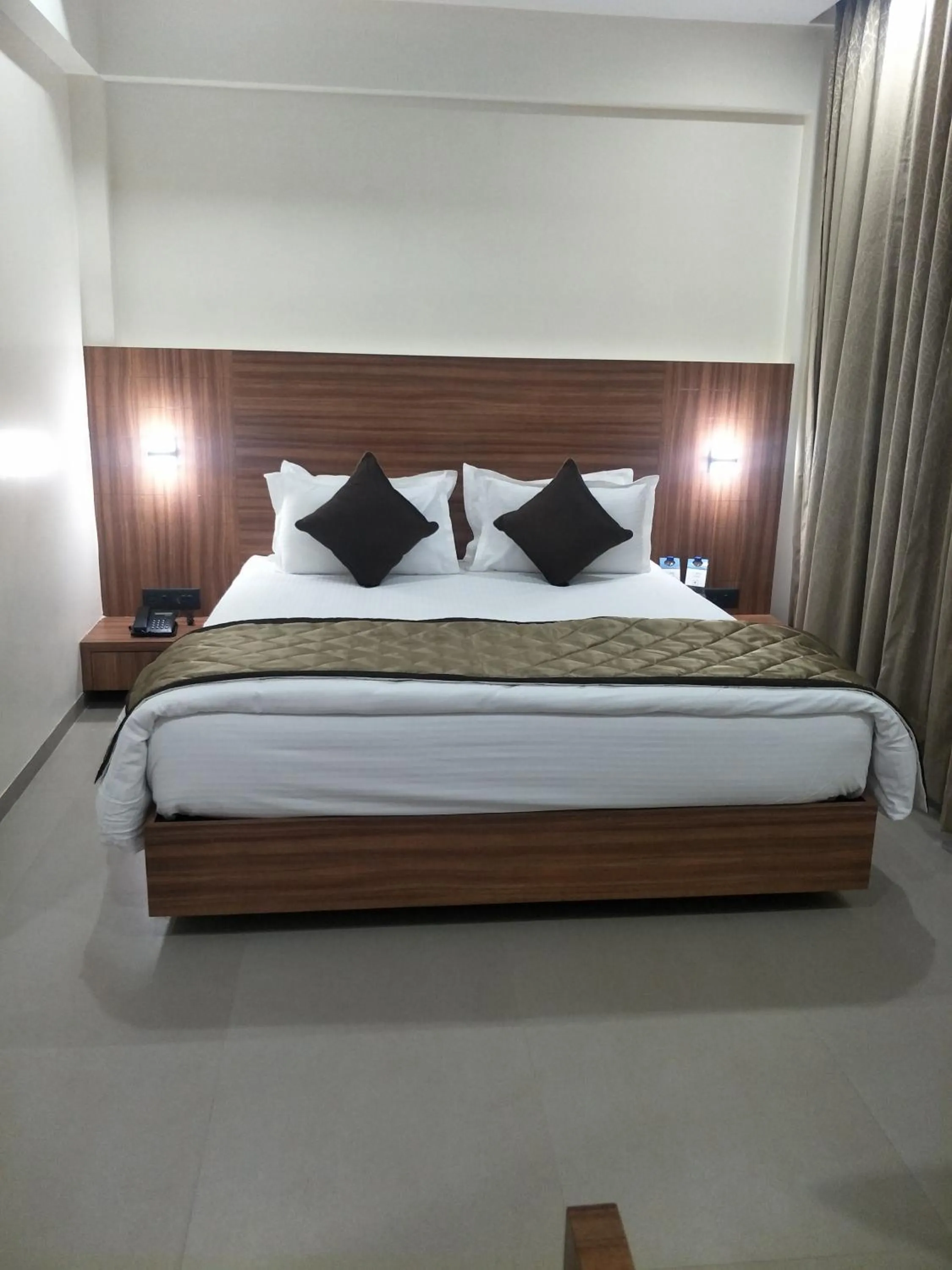 Bed in Kyriad Hotel Solapur by OTHPL