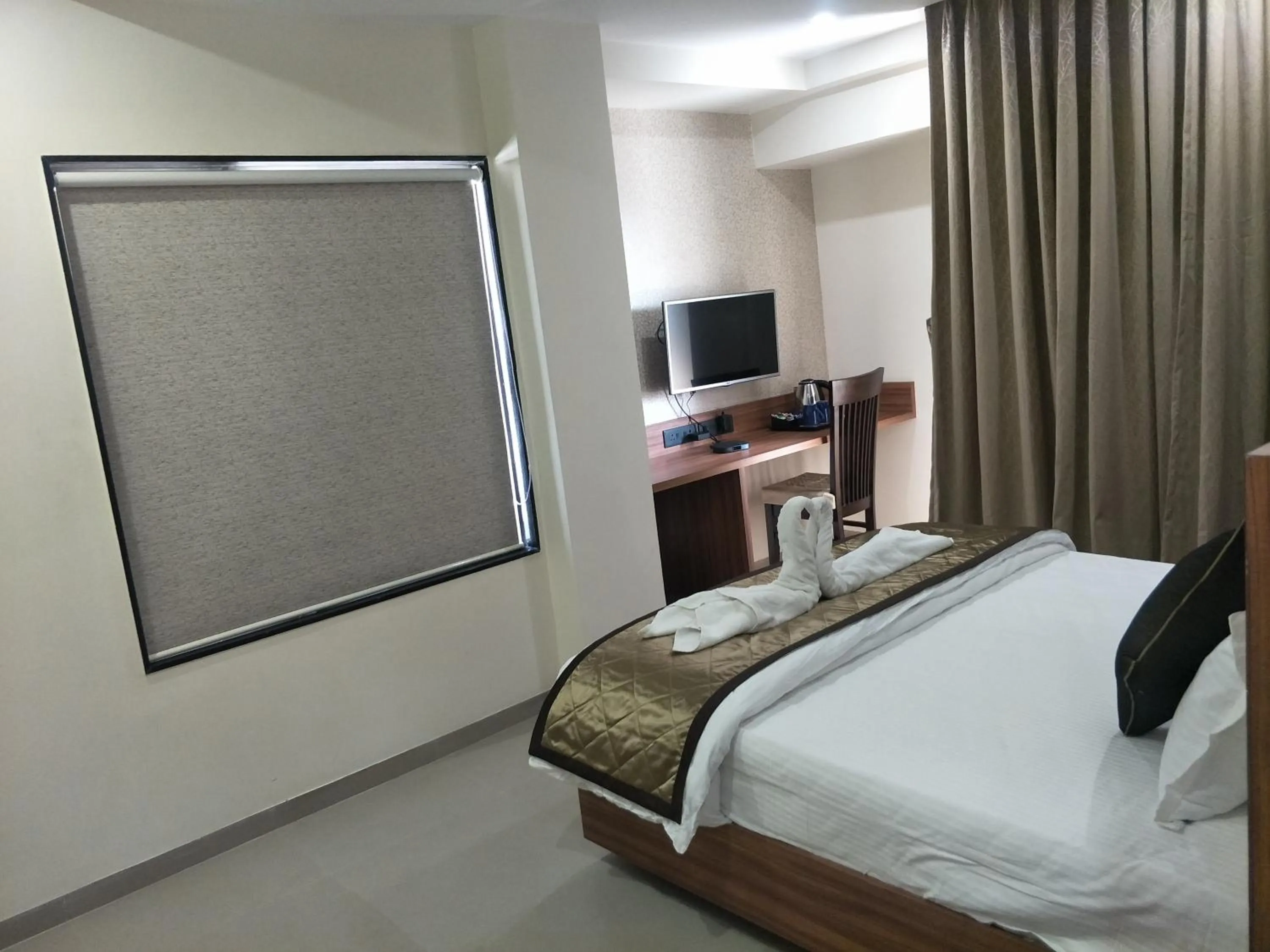 Bed in Kyriad Hotel Solapur by OTHPL