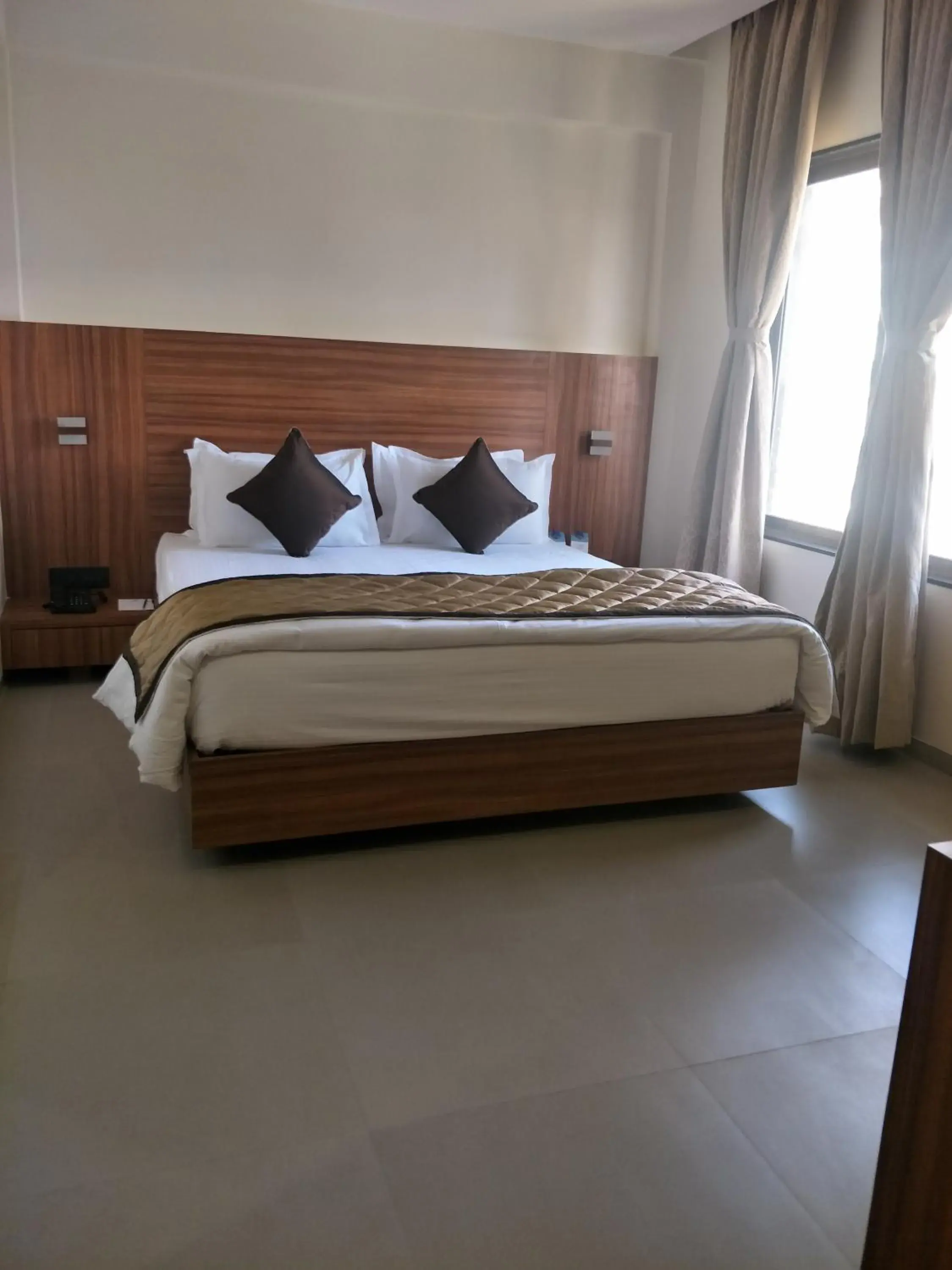 Bed in Kyriad Hotel Solapur by OTHPL Bed in Kyriad Hotel Solapur by OTHPL