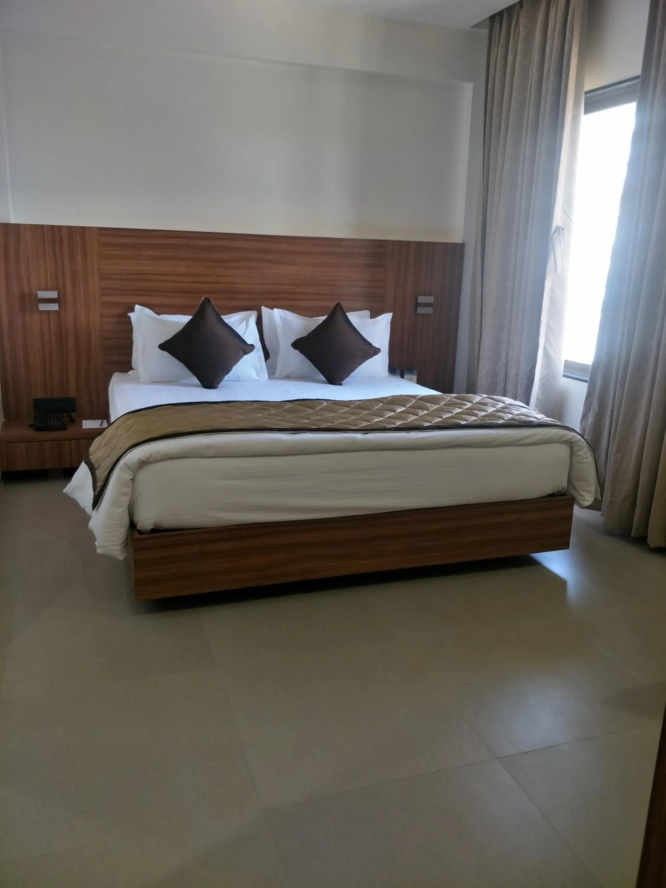 Bed in Kyriad Hotel Solapur by OTHPL