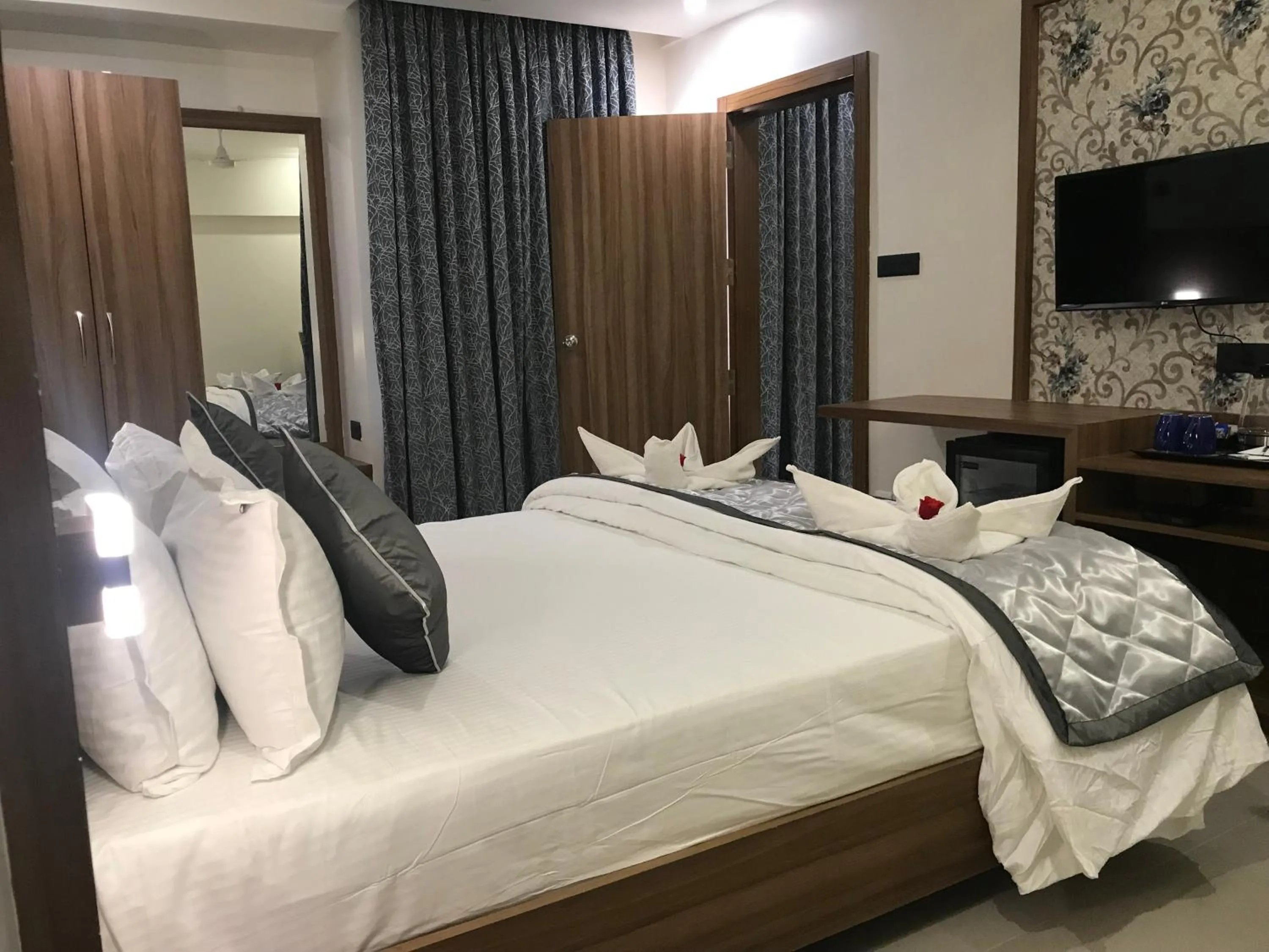 Bed in Kyriad Hotel Solapur by OTHPL