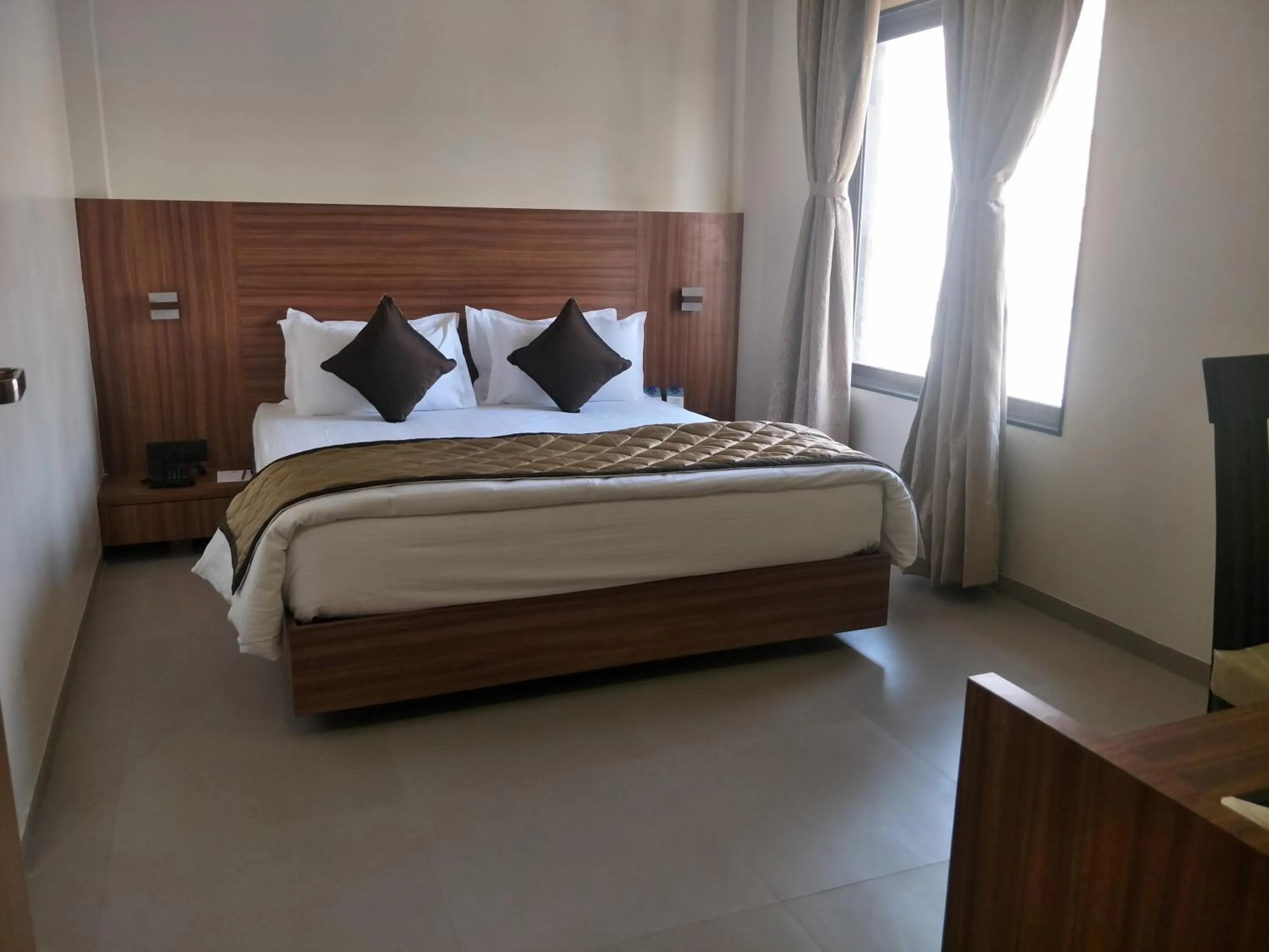 Bed in Kyriad Hotel Solapur by OTHPL