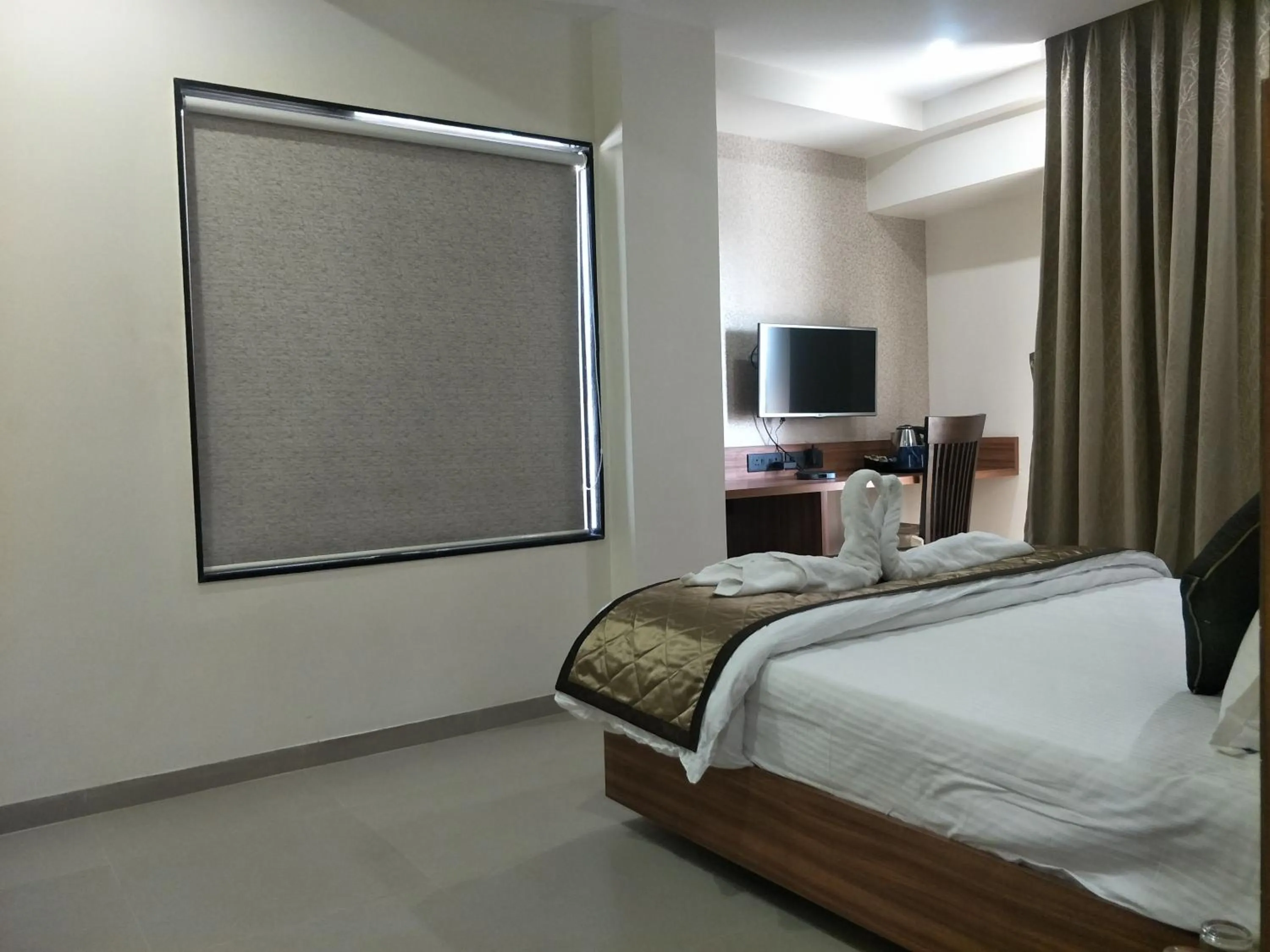 Bed in Kyriad Hotel Solapur by OTHPL