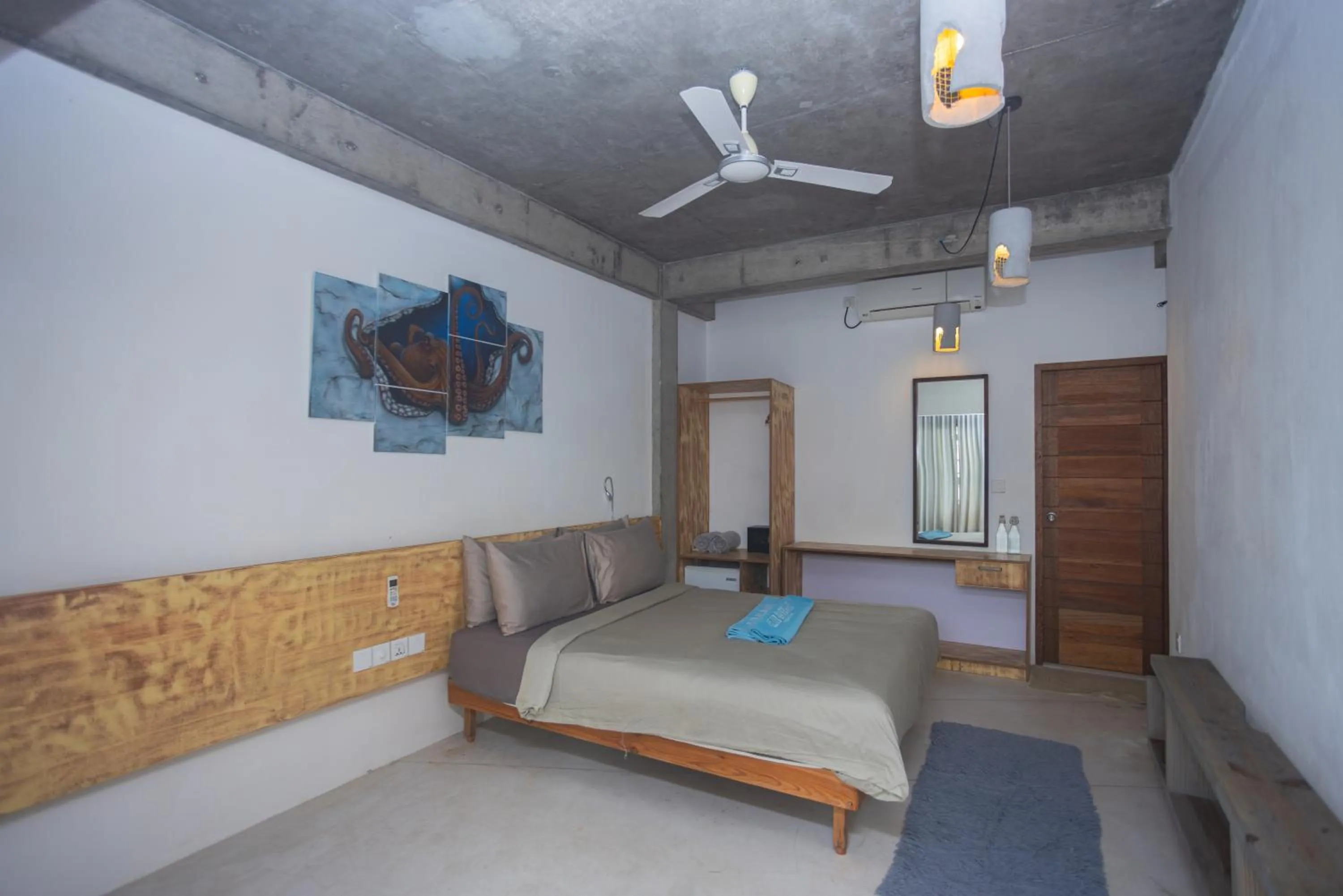 Seating area, Bed in Club Gabbiano