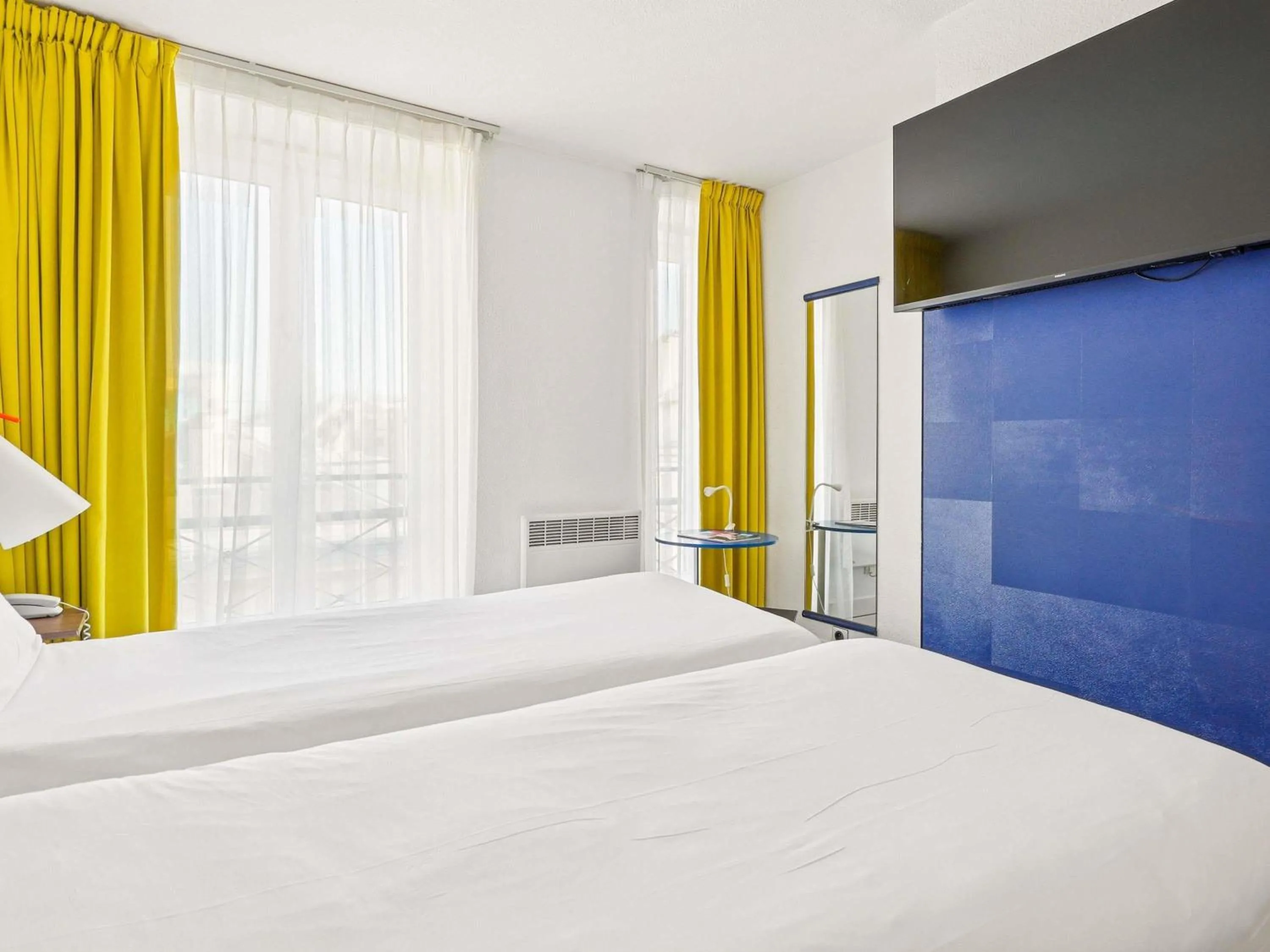 Bedroom, Bed in ibis Styles Paris République Le Marais