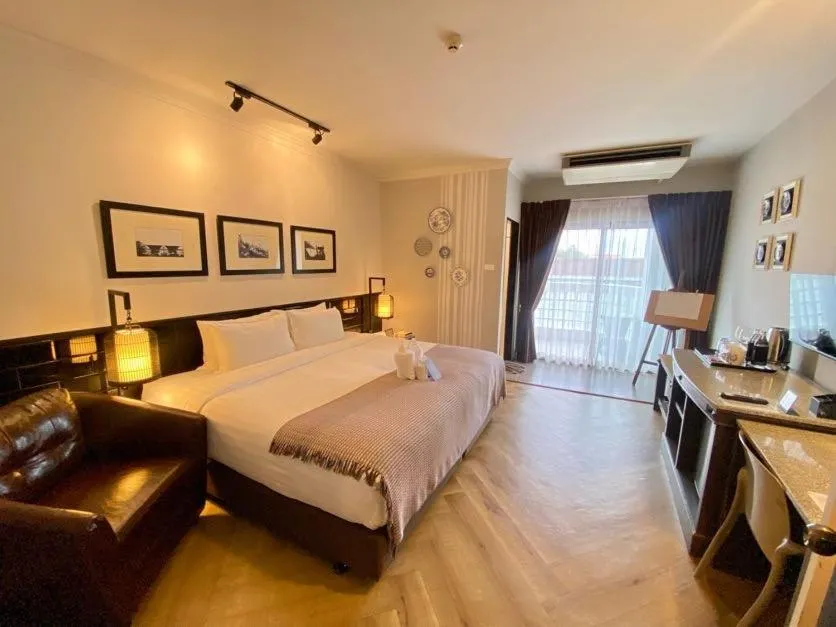 Photo of the whole room, Bed in Yuu Hotel Ubon Ratchathani